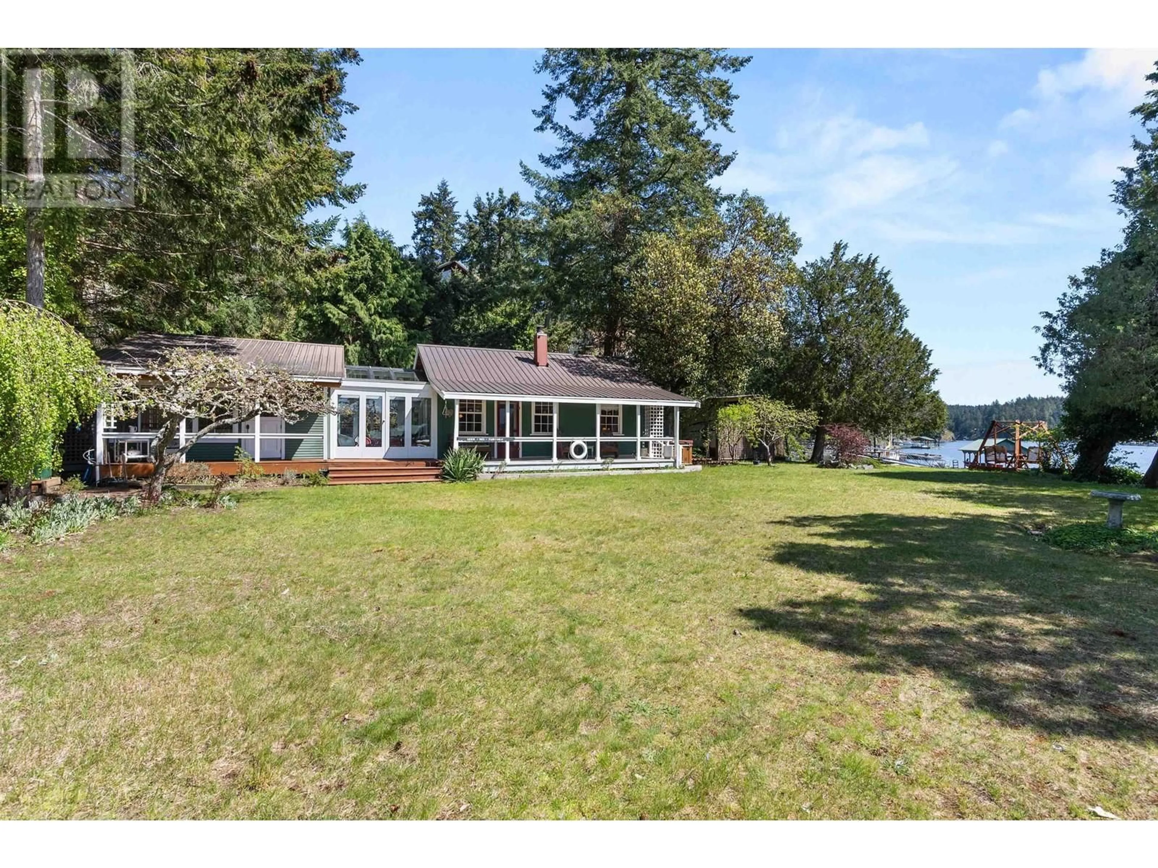 A pic from outside/outdoor area/front of a property/back of a property/a pic from drone, water/lake/river/ocean view for 5400 SANS SOUCI ROAD, Halfmoon Bay British Columbia V7Z1B6