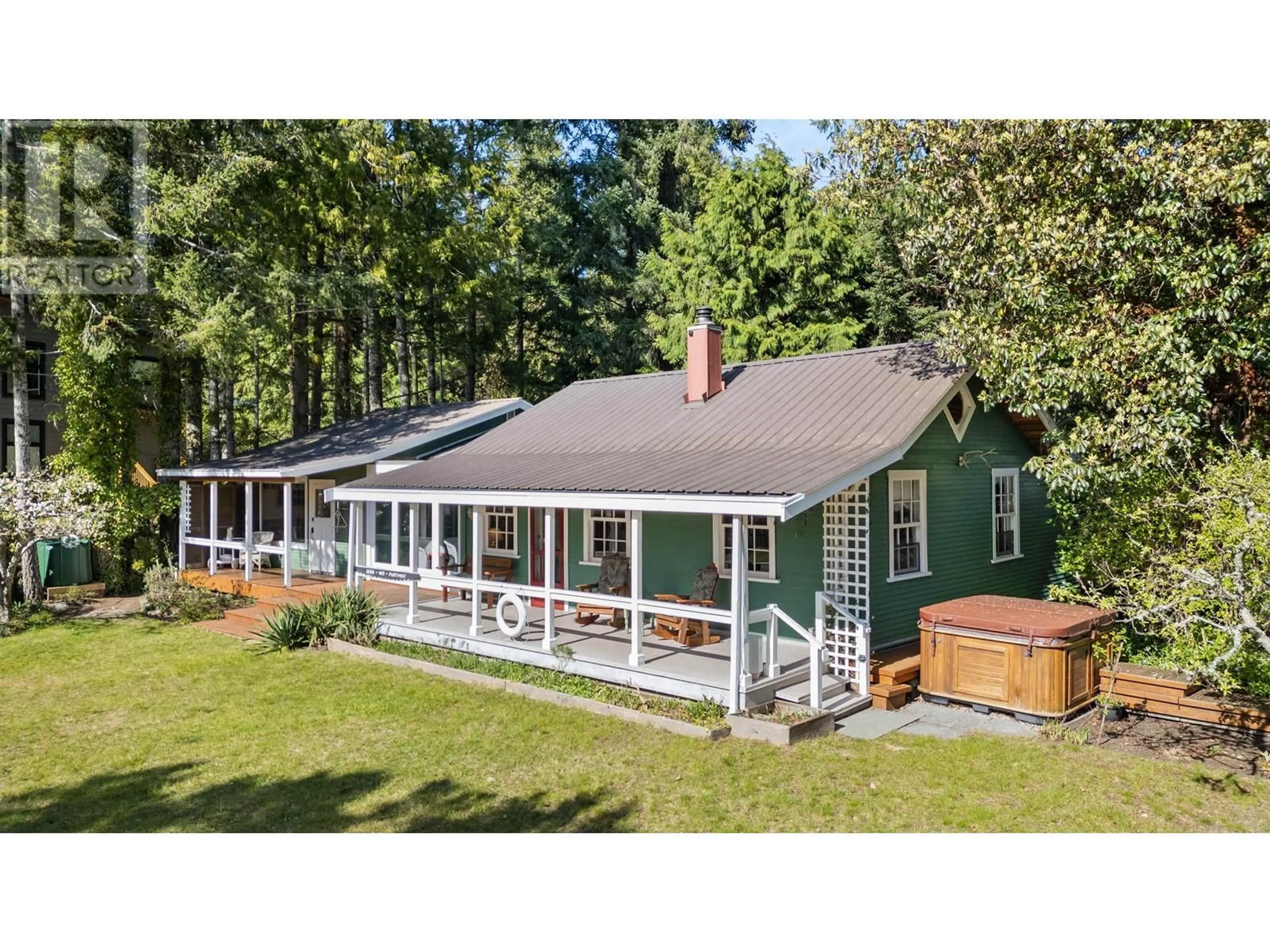 A pic from outside/outdoor area/front of a property/back of a property/a pic from drone, water/lake/river/ocean view for 5400 SANS SOUCI ROAD, Halfmoon Bay British Columbia V7Z1B6