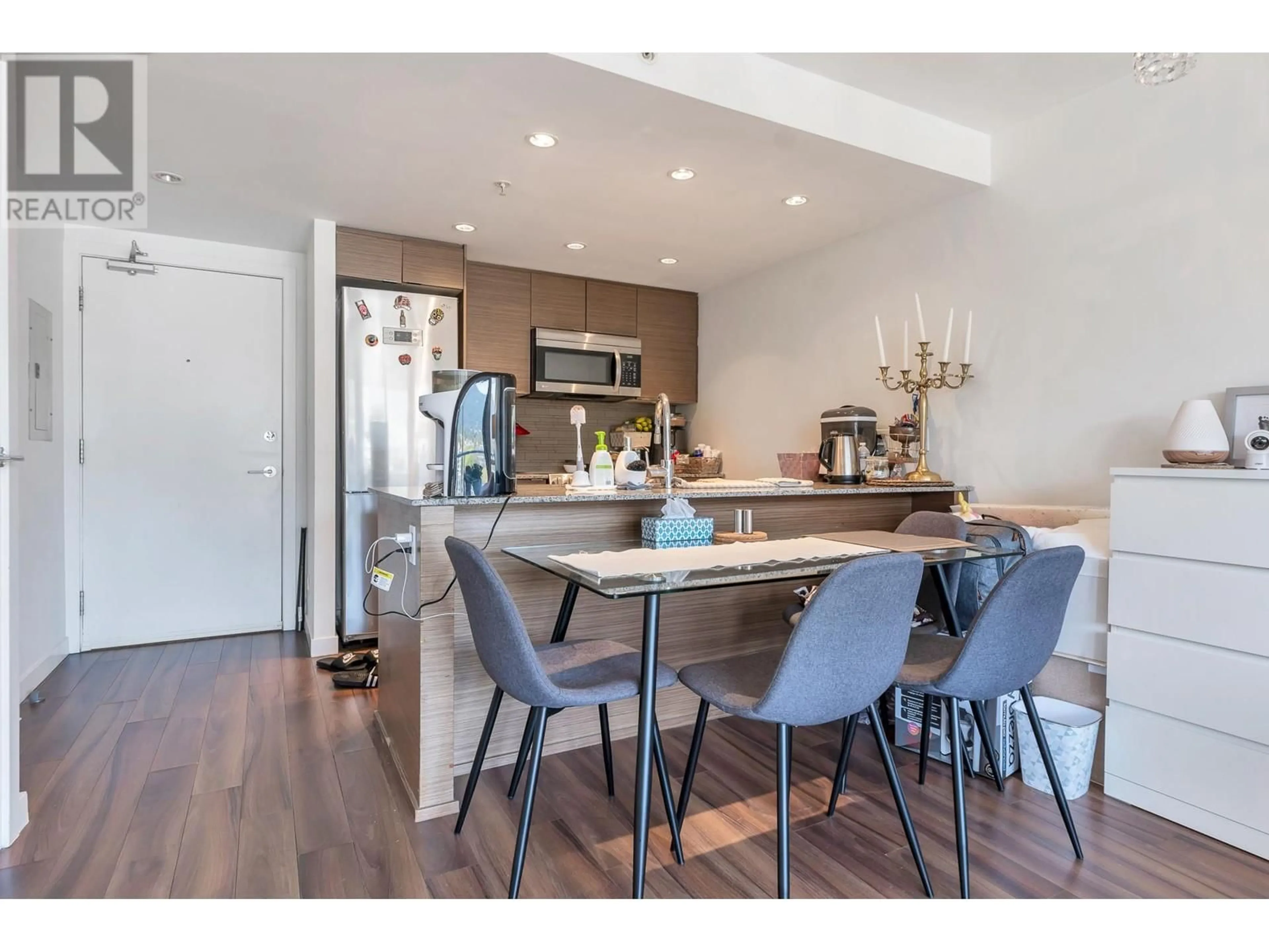 Open concept kitchen, wood/laminate floor for 704 - 135 17TH STREET, North Vancouver British Columbia V7L0C4