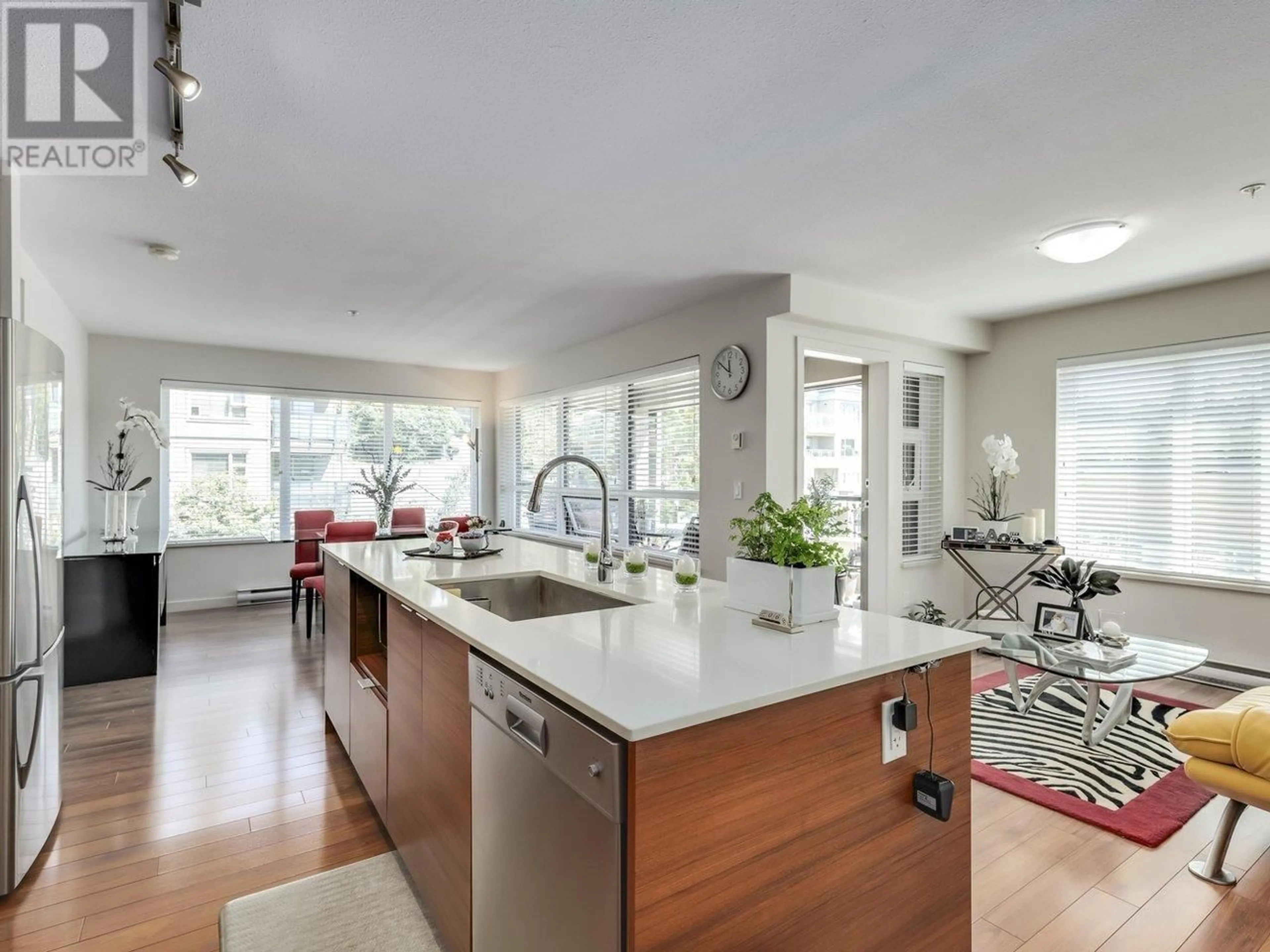 Open concept kitchen, unknown for 304 - 1673 LLOYD AVENUE, North Vancouver British Columbia V7P0A9