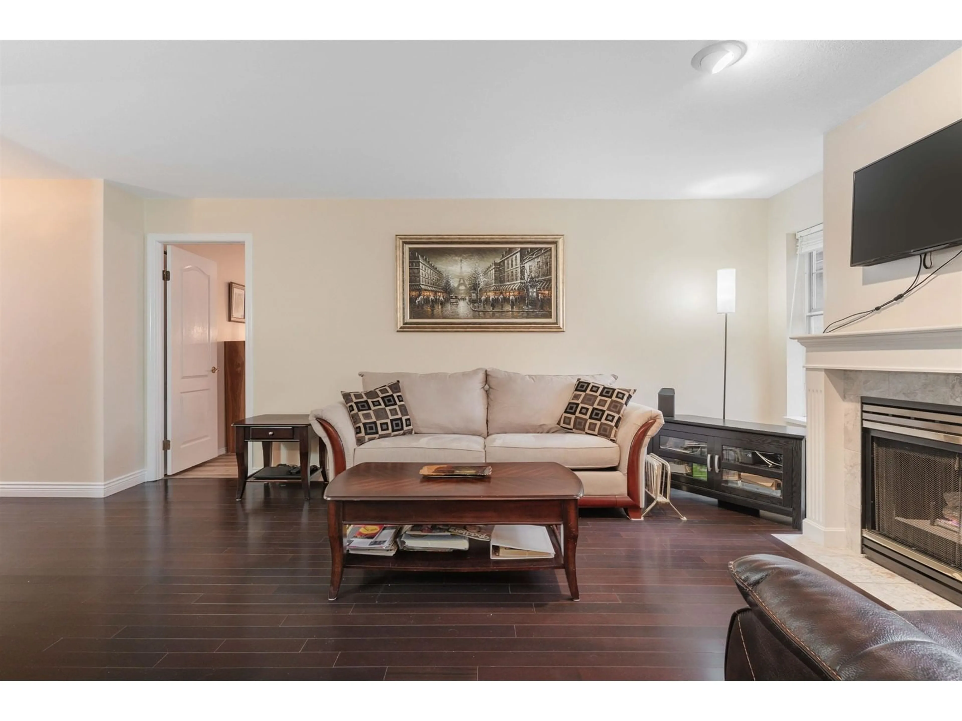 Living room with furniture, wood/laminate floor for 112 - 14861 98, Surrey British Columbia V3R9Z8