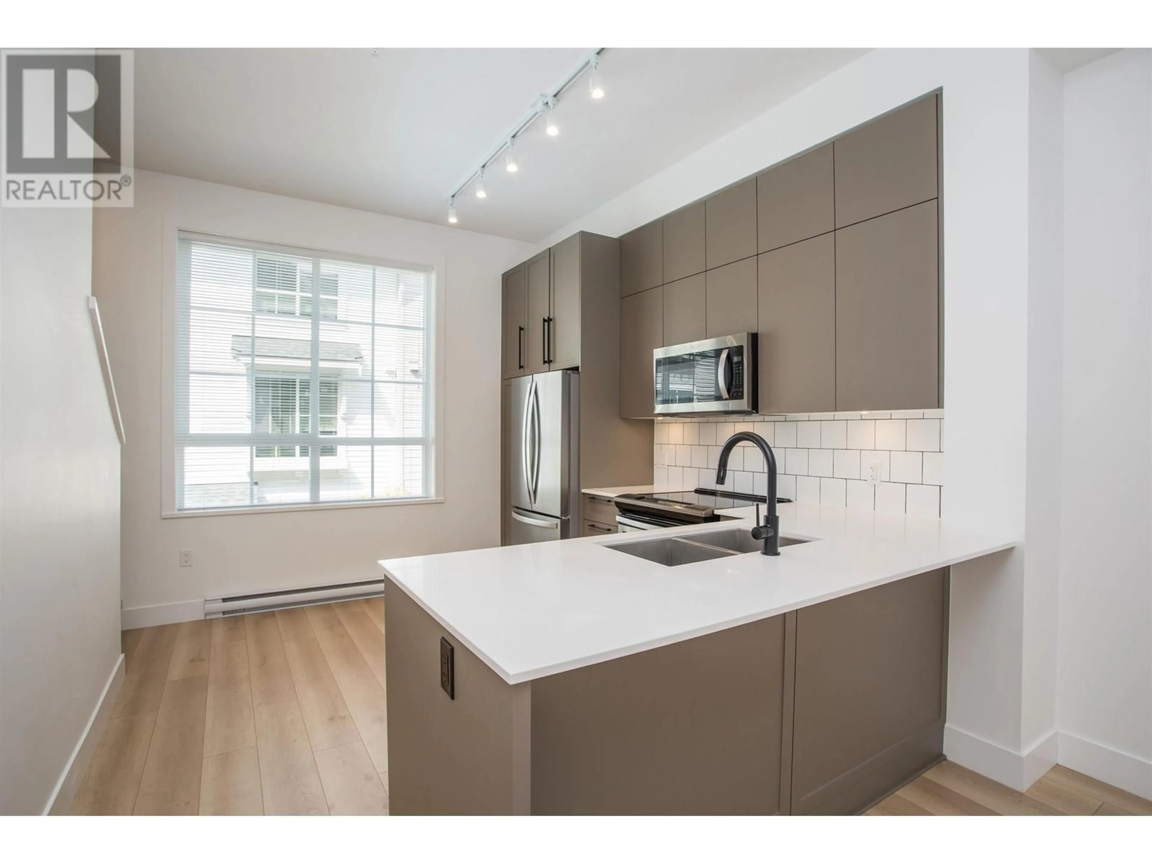Open concept kitchen, unknown for 57 - 19696 HAMMOND ROAD, Pitt Meadows British Columbia V3Y0G7