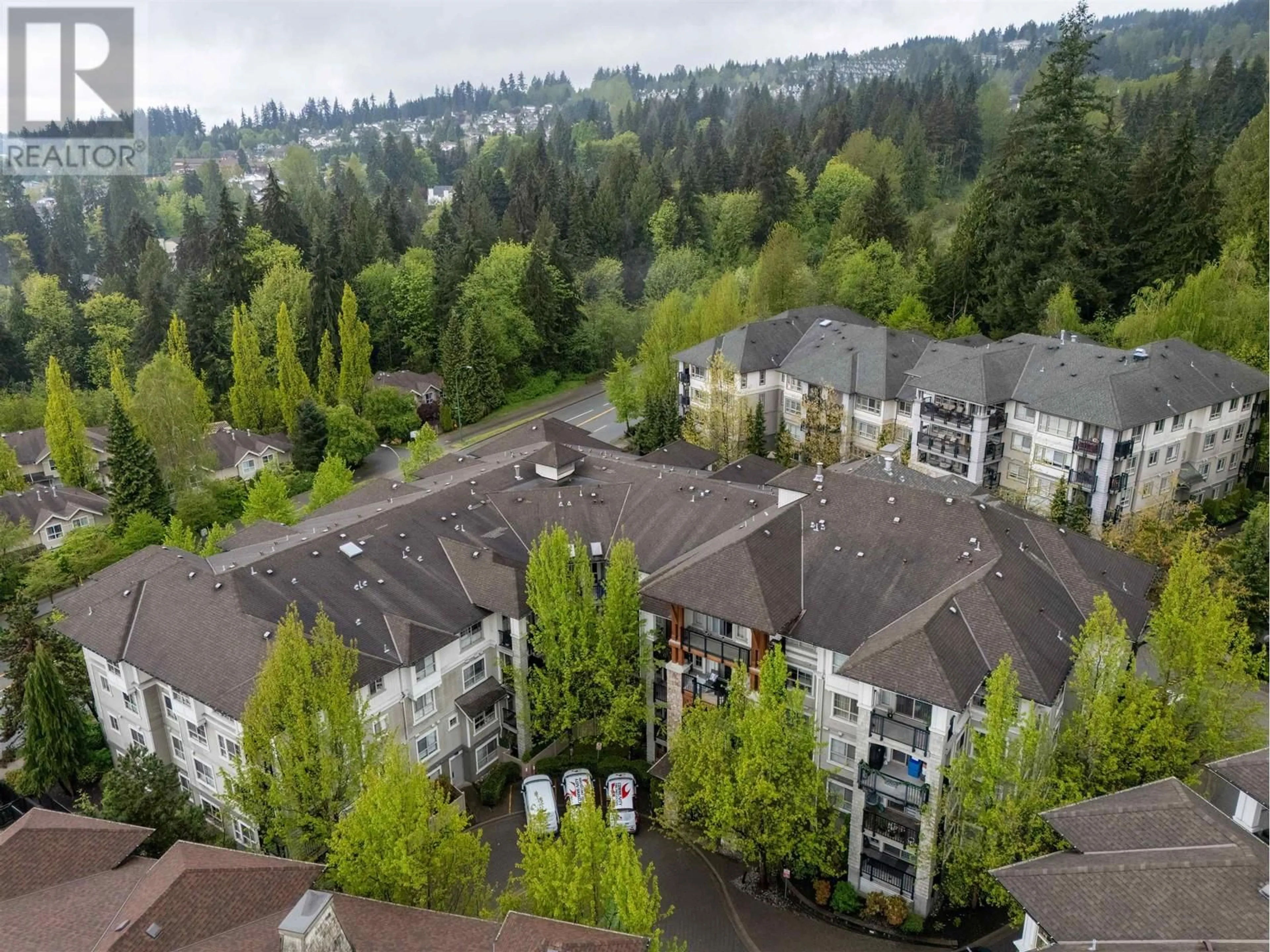 A pic from outside/outdoor area/front of a property/back of a property/a pic from drone, unknown for 304 - 2958 SILVER SPRINGS BOULEVARD, Coquitlam British Columbia V3E3R9