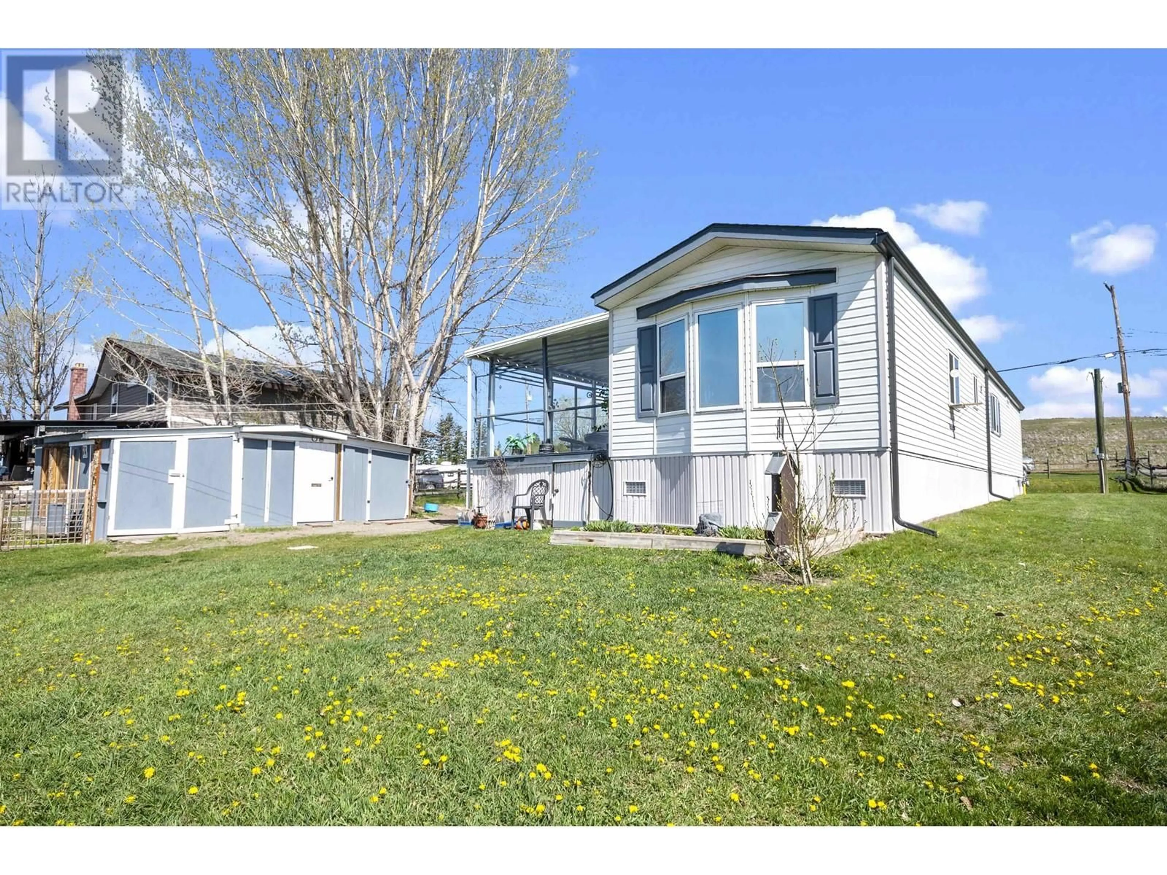 Home with vinyl exterior material, unknown for 5480 TATTON STATION ROAD, 100 Mile House British Columbia V0K2E1