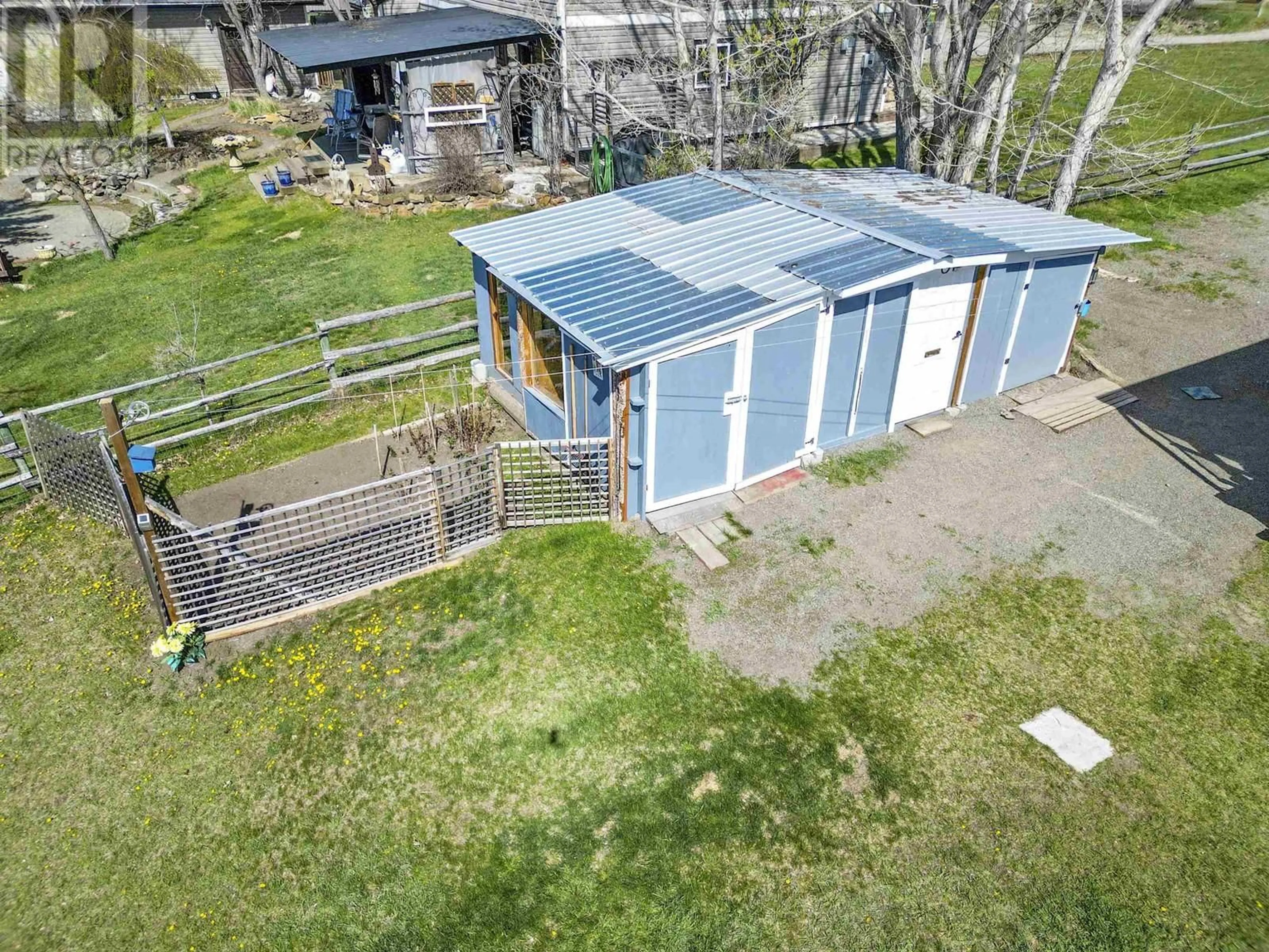 A pic from outside/outdoor area/front of a property/back of a property/a pic from drone, building for 5480 TATTON STATION ROAD, 100 Mile House British Columbia V0K2E1
