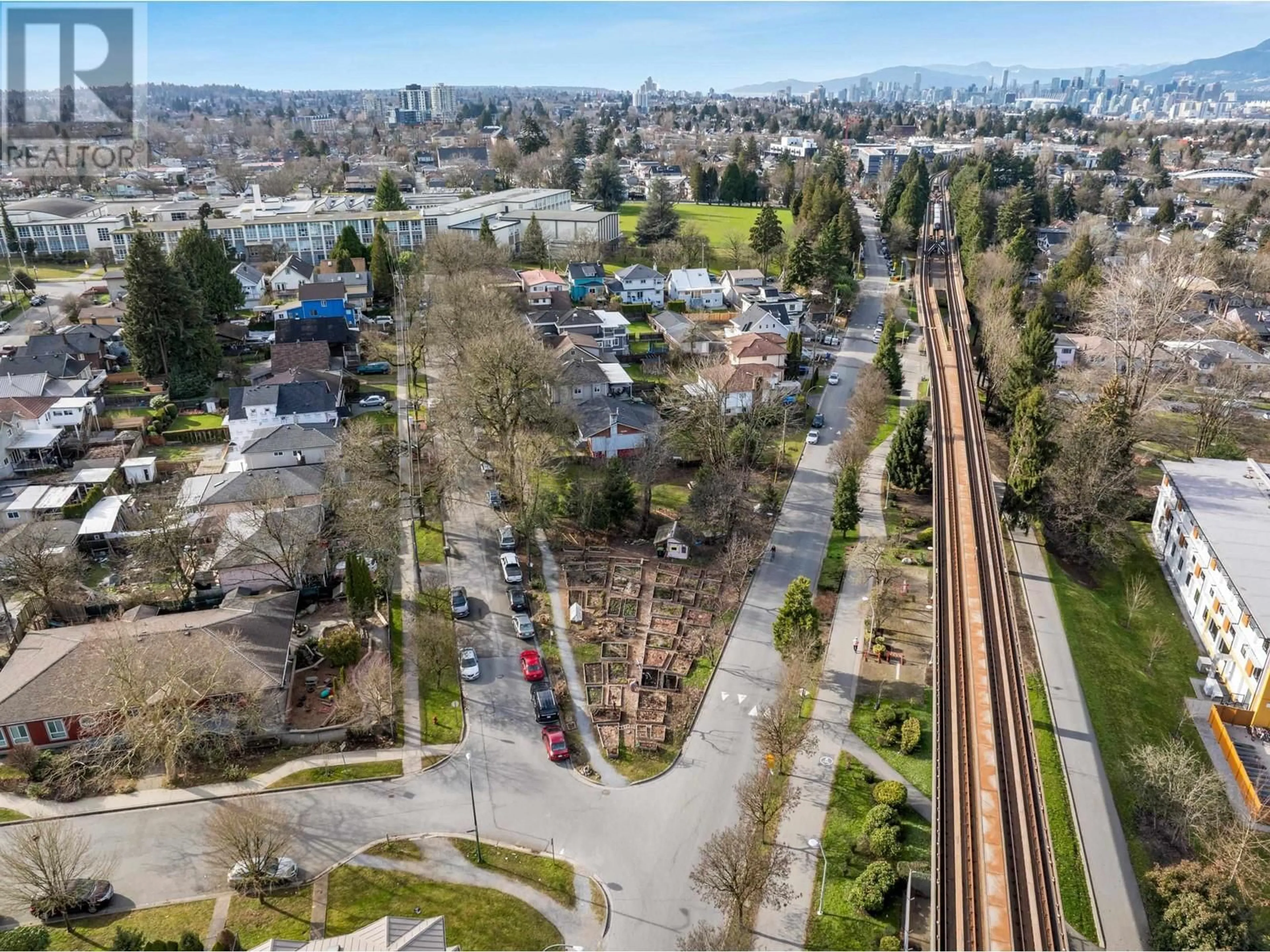 A pic from outside/outdoor area/front of a property/back of a property/a pic from drone, street for 2255 24TH AVENUE, Vancouver British Columbia V5N2V3