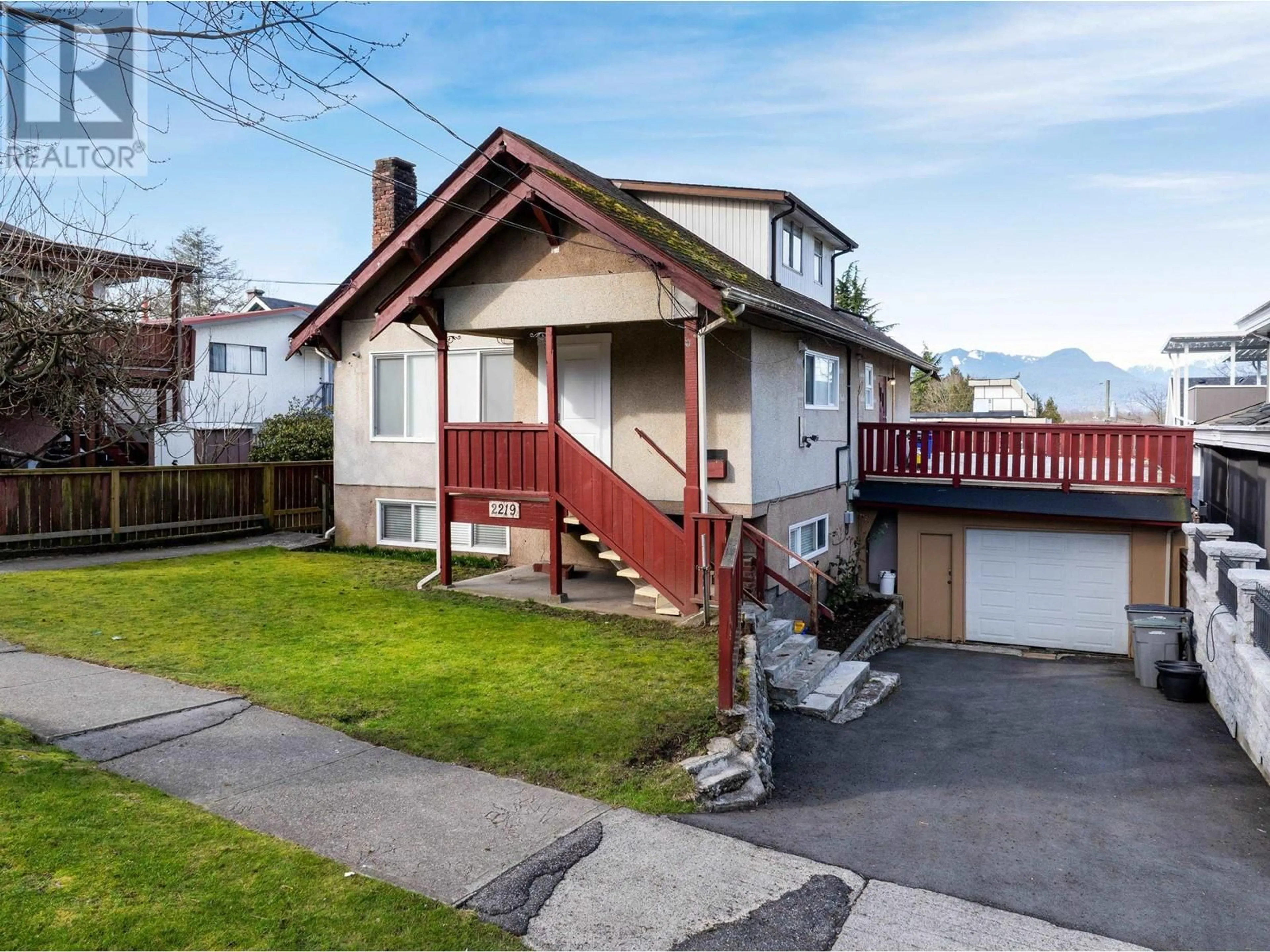 Home with vinyl exterior material, mountain view for 2219 24TH AVENUE, Vancouver British Columbia V5N2V3
