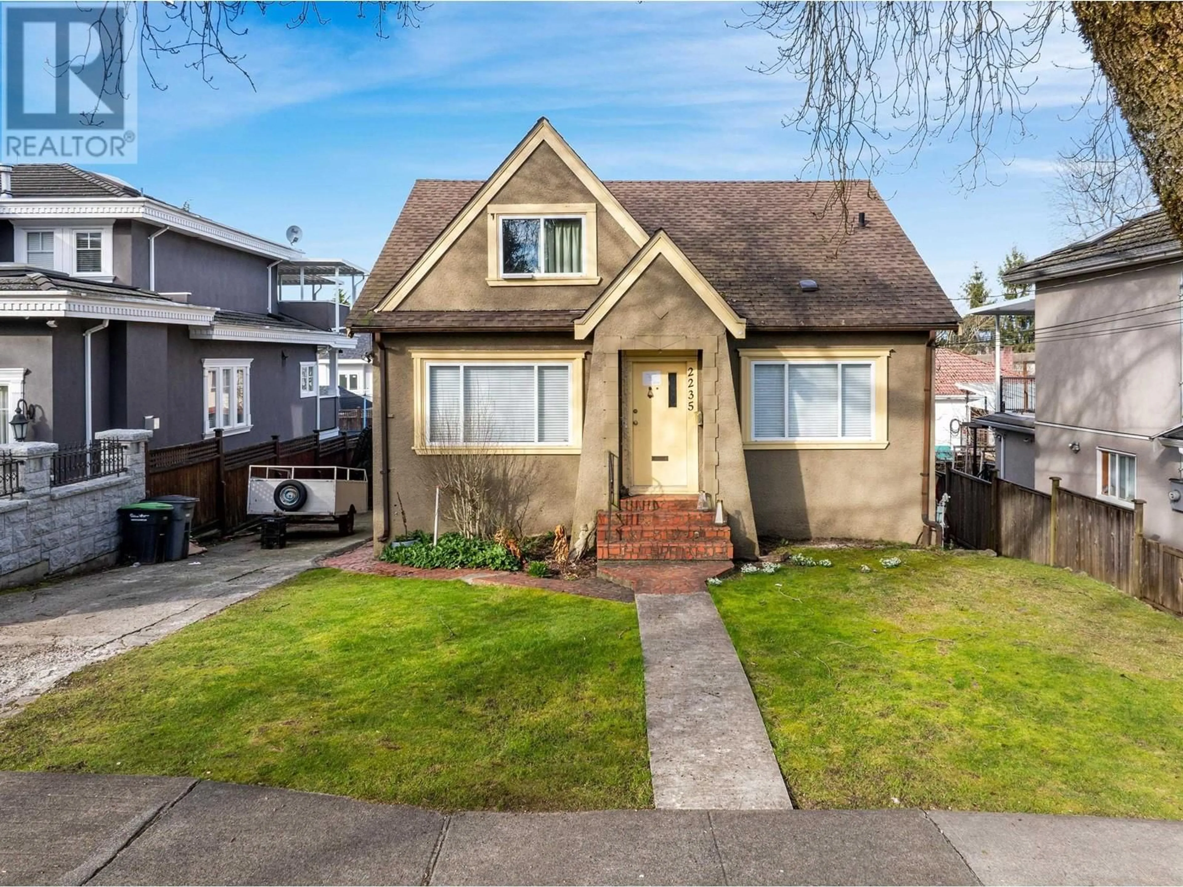 Home with vinyl exterior material, street for 2235 24TH AVENUE, Vancouver British Columbia V5N2V3