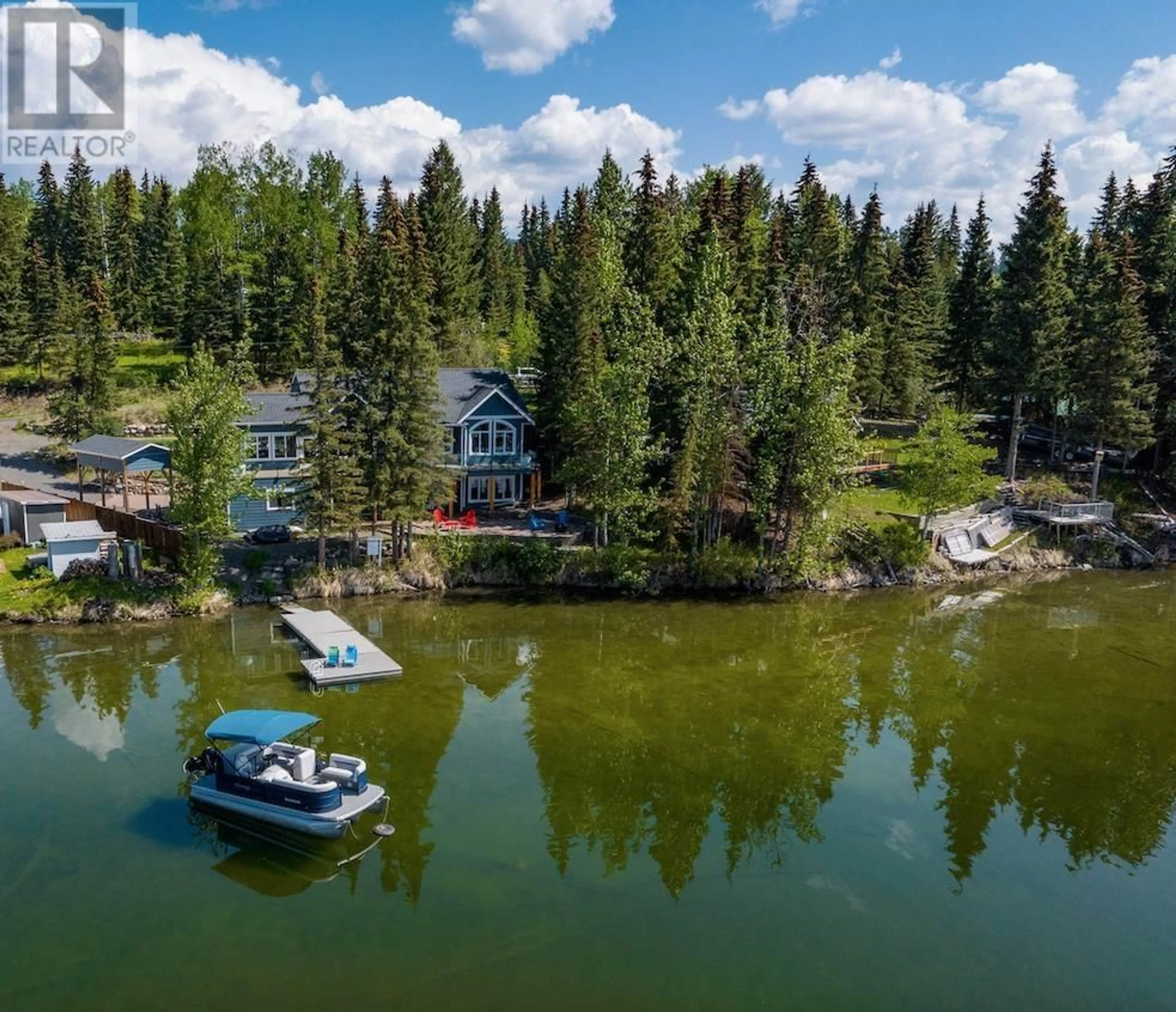A pic from outside/outdoor area/front of a property/back of a property/a pic from drone, water/lake/river/ocean view for 7922 DEAN ROAD, Bridge Lake British Columbia V0K1X2