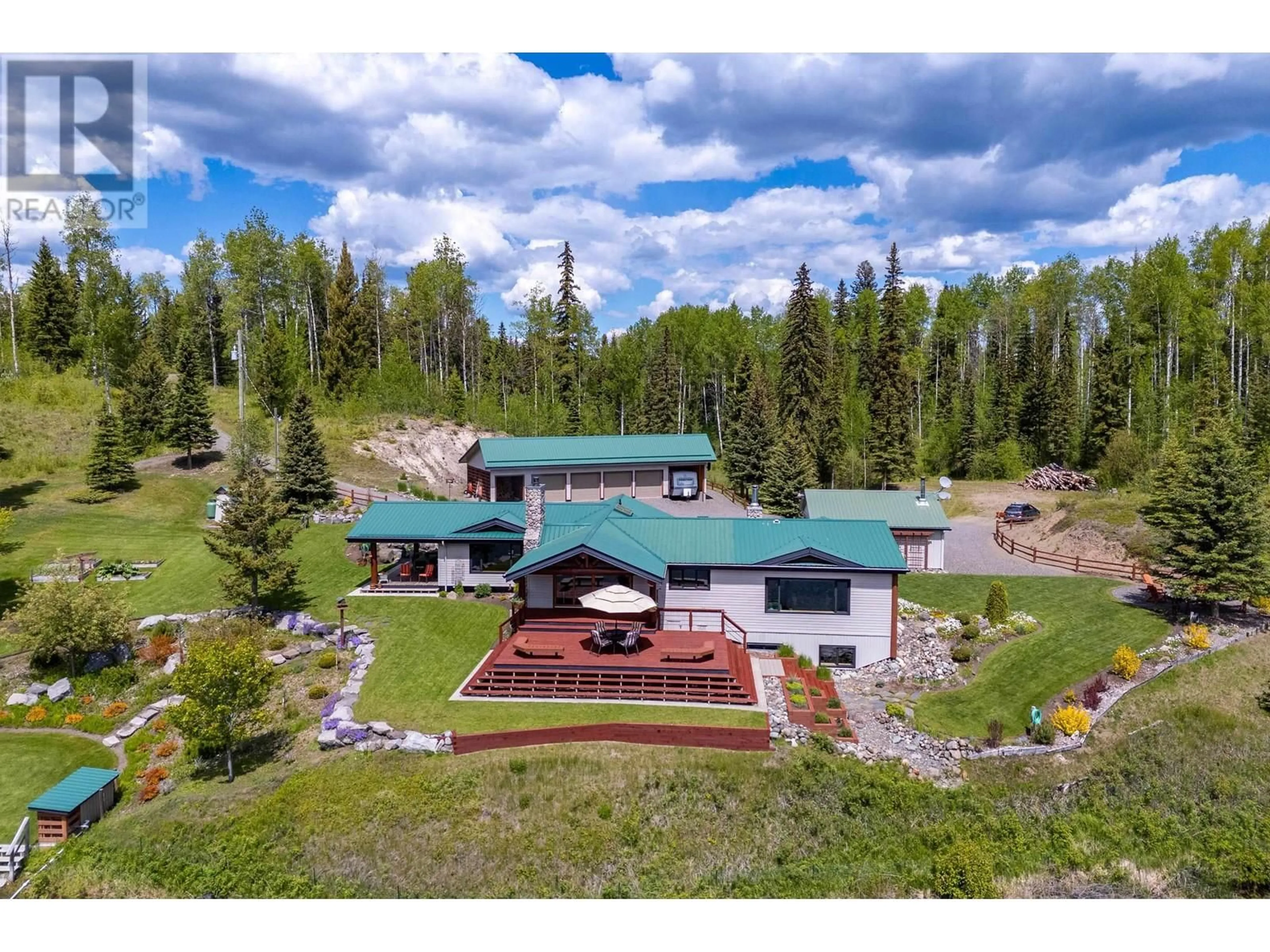 A pic from outside/outdoor area/front of a property/back of a property/a pic from drone, mountain view for 7315 SHERTENLIB ROAD, Bridge Lake British Columbia V0K1X2