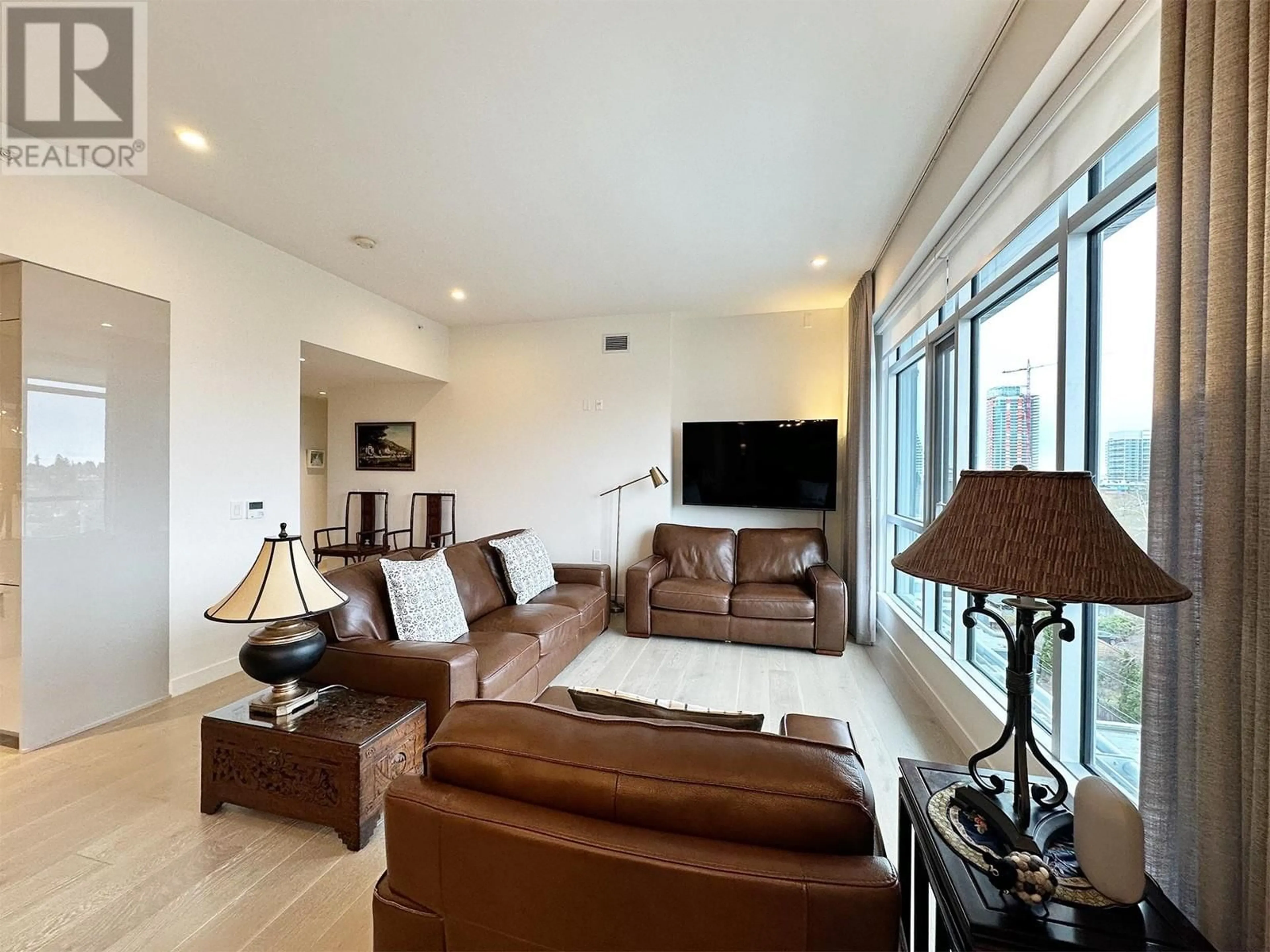 Living room with furniture, unknown for 601 - 5189 CAMBIE STREET, Vancouver British Columbia V5Z2Z6