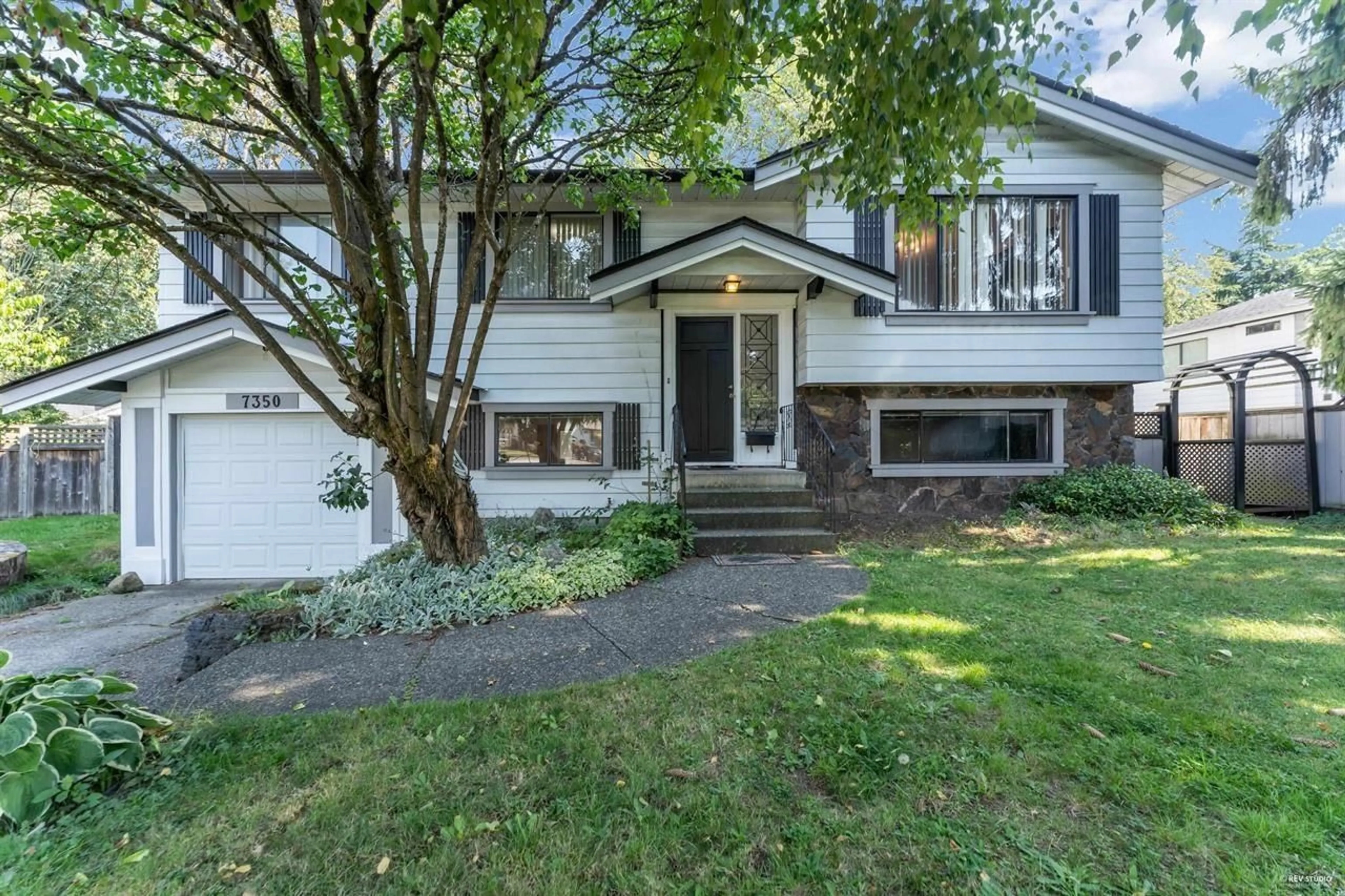 Home with vinyl exterior material, street for 7350 141, Surrey British Columbia V3W7L1