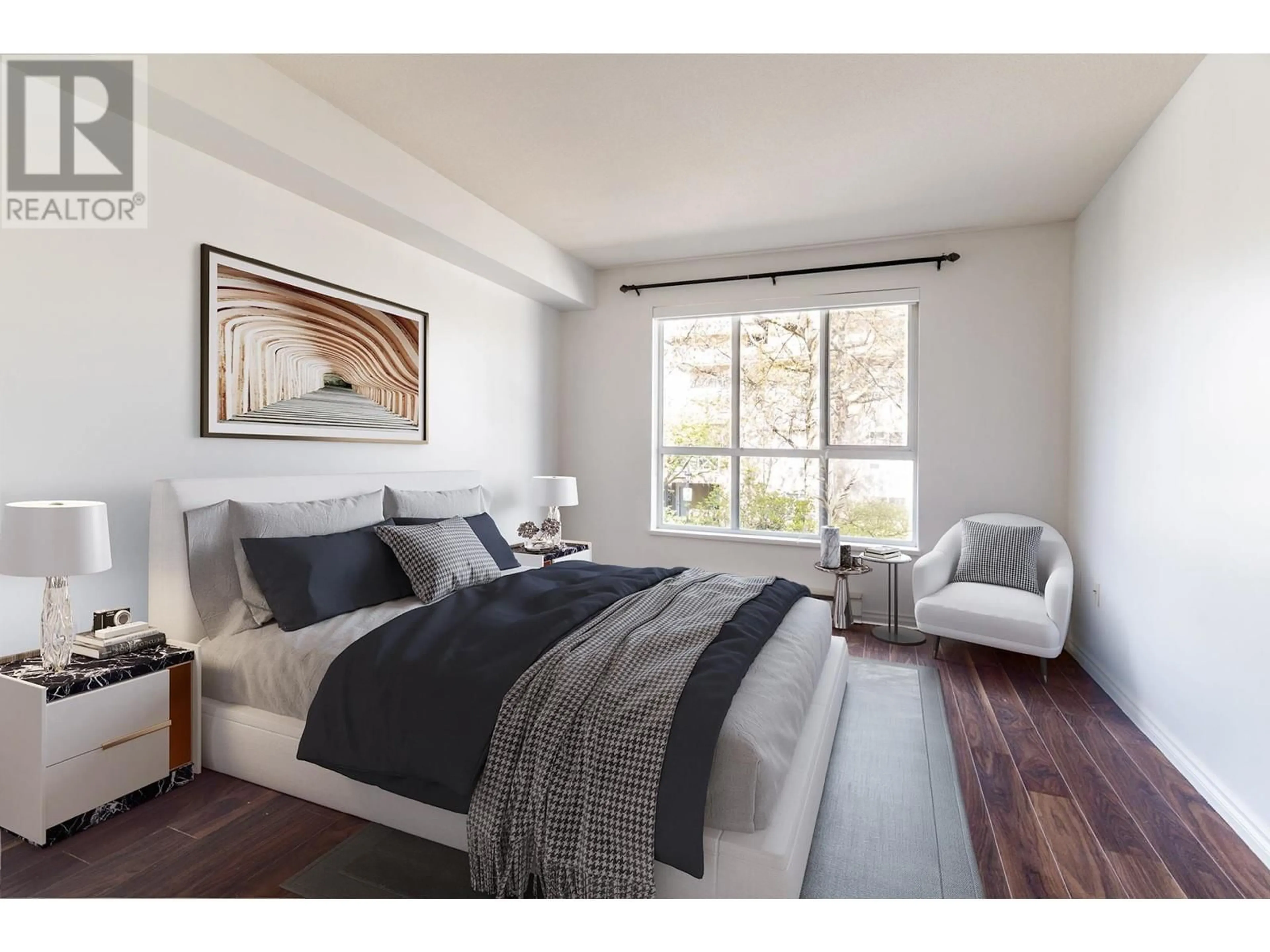 Bedroom with bed, wood/laminate floor for 203 - 2559 PARKVIEW LANE, Port Coquitlam British Columbia V3C6M1