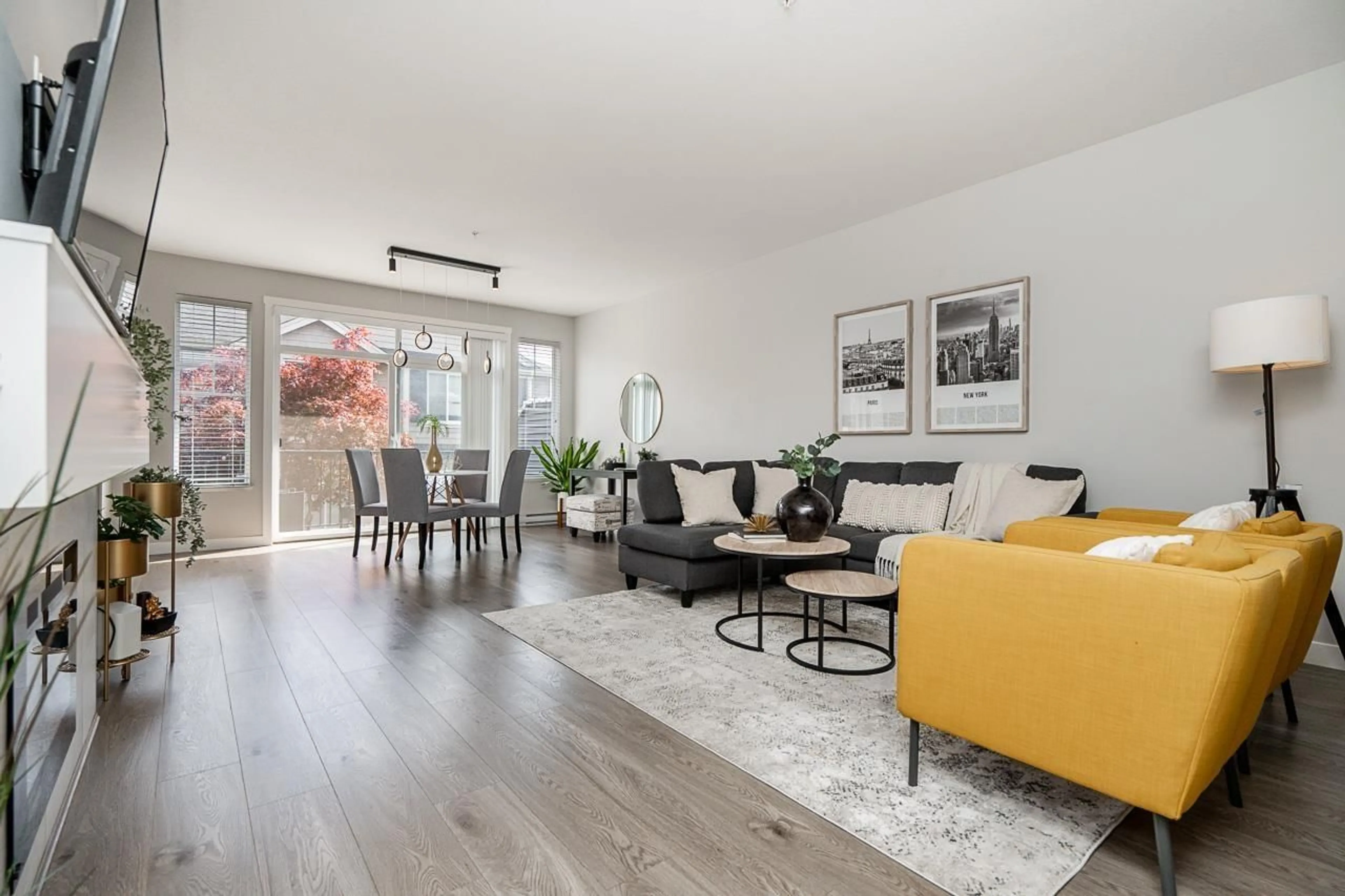 Living room with furniture, wood/laminate floor for 50 - 7169 208A, Langley British Columbia V2Y0X2