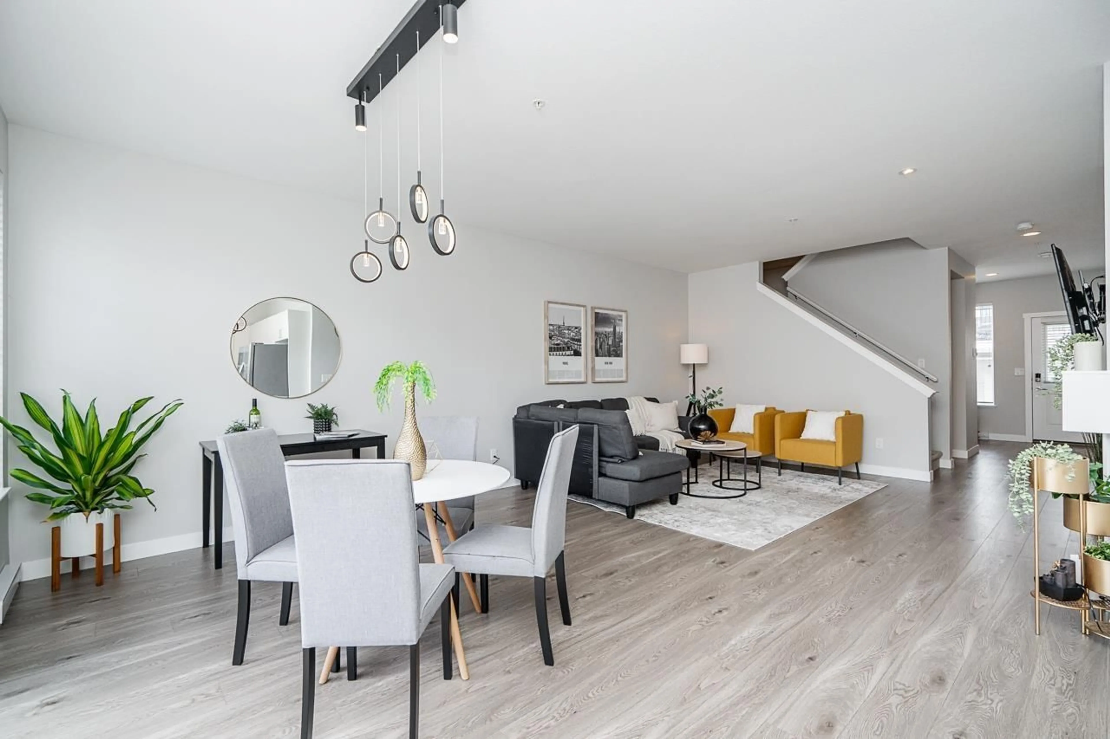 Living room with furniture, wood/laminate floor for 50 - 7169 208A, Langley British Columbia V2Y0X2