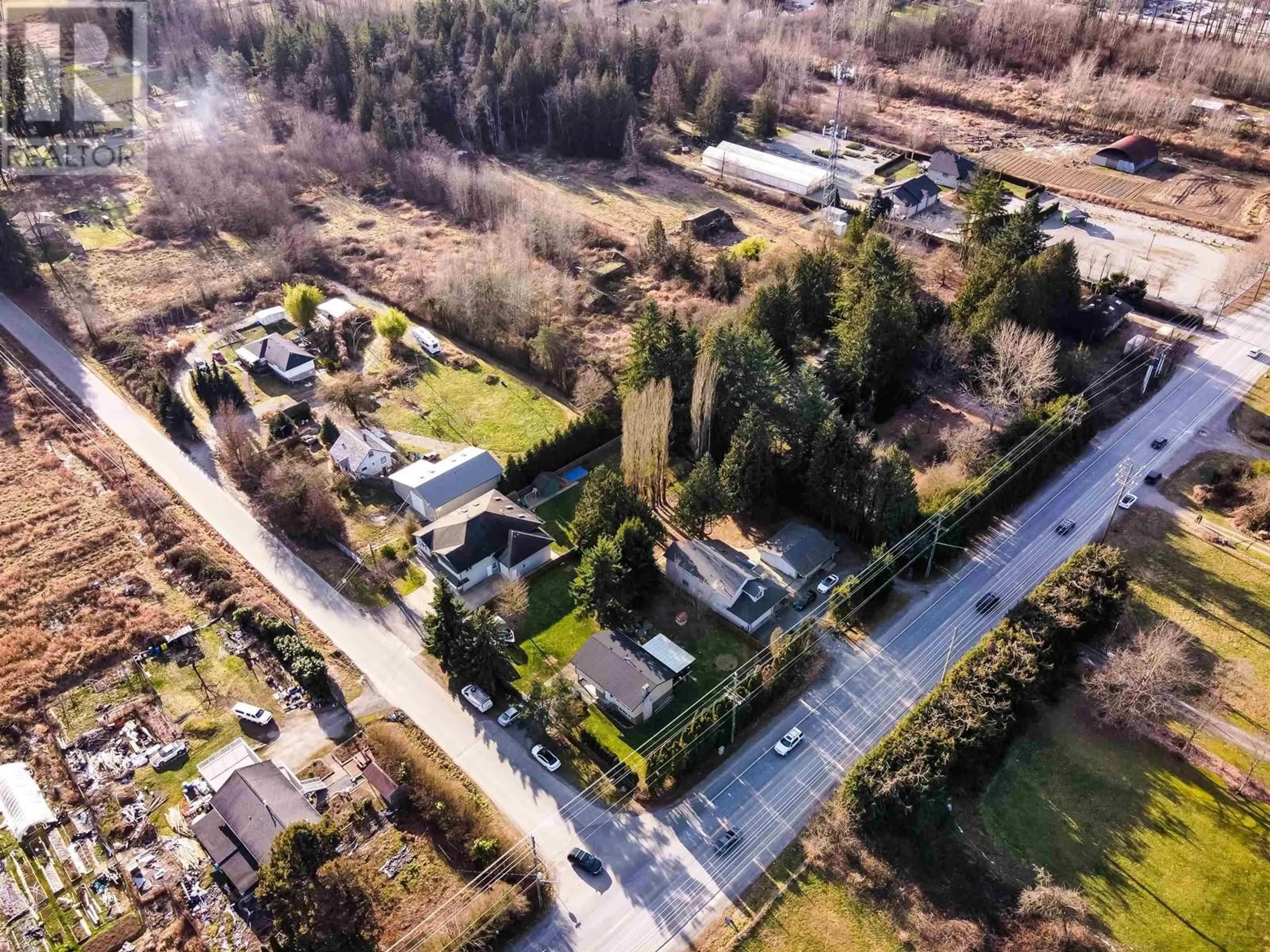 A pic from outside/outdoor area/front of a property/back of a property/a pic from drone, street for 24216 DEWDNEY TRUNK ROAD, Maple Ridge British Columbia V4R1W6