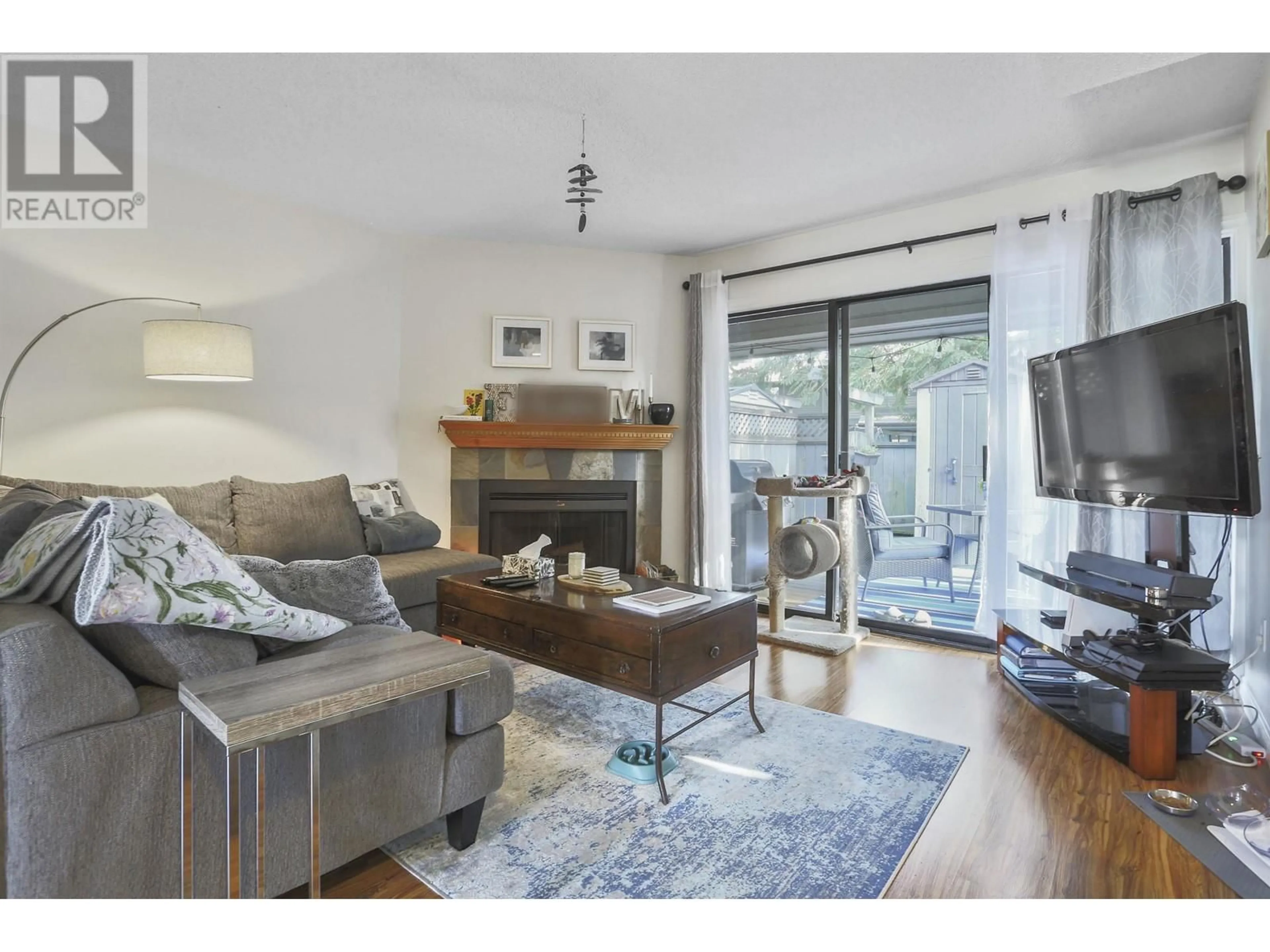 Living room with furniture, wood/laminate floor for 3 - 1174 INLET STREET, Coquitlam British Columbia V3B6E4