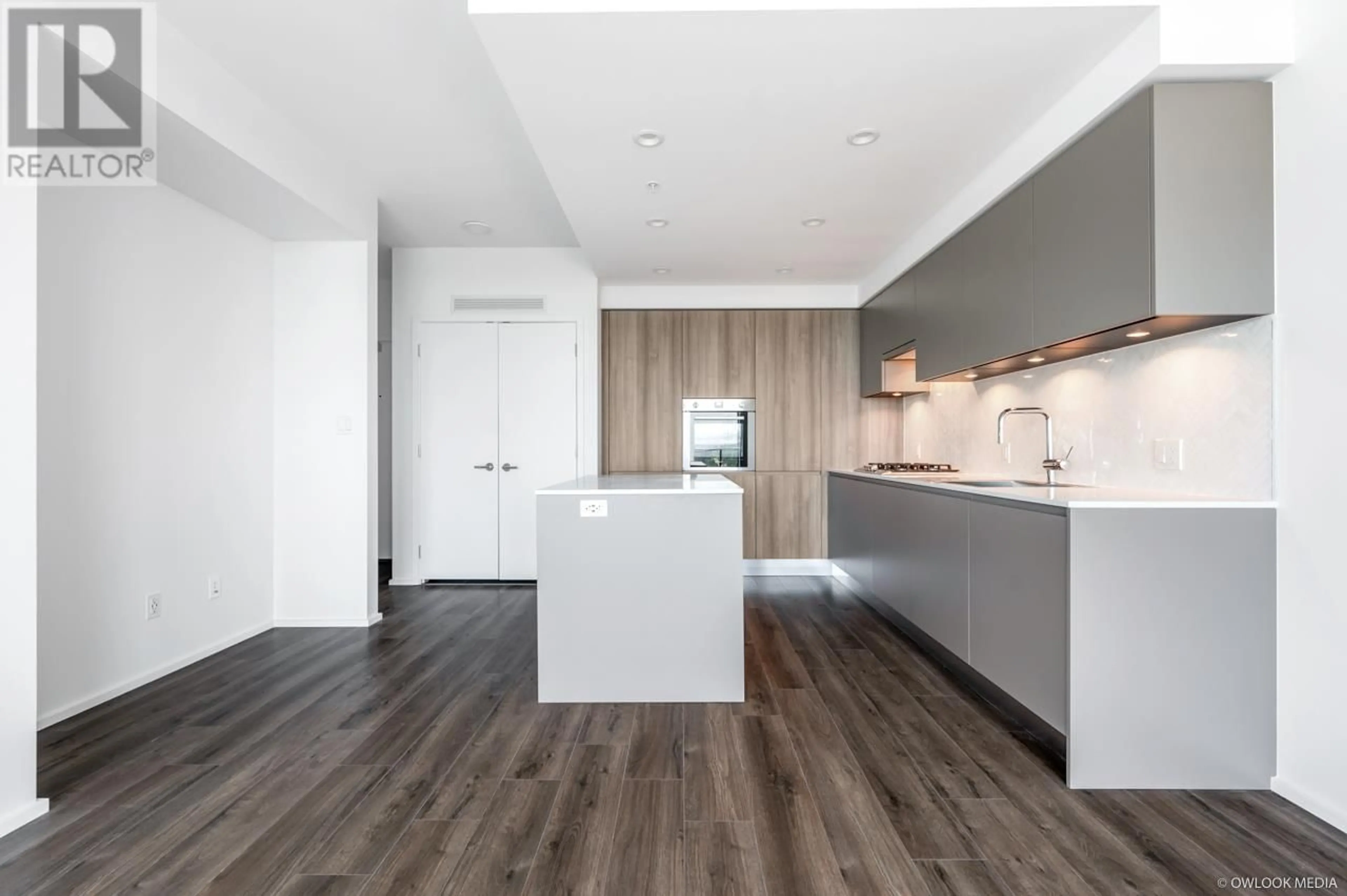 Open concept kitchen, wood/laminate floor for 3902 - 3809 EVERGREEN PLACE, Burnaby British Columbia V3J0M1