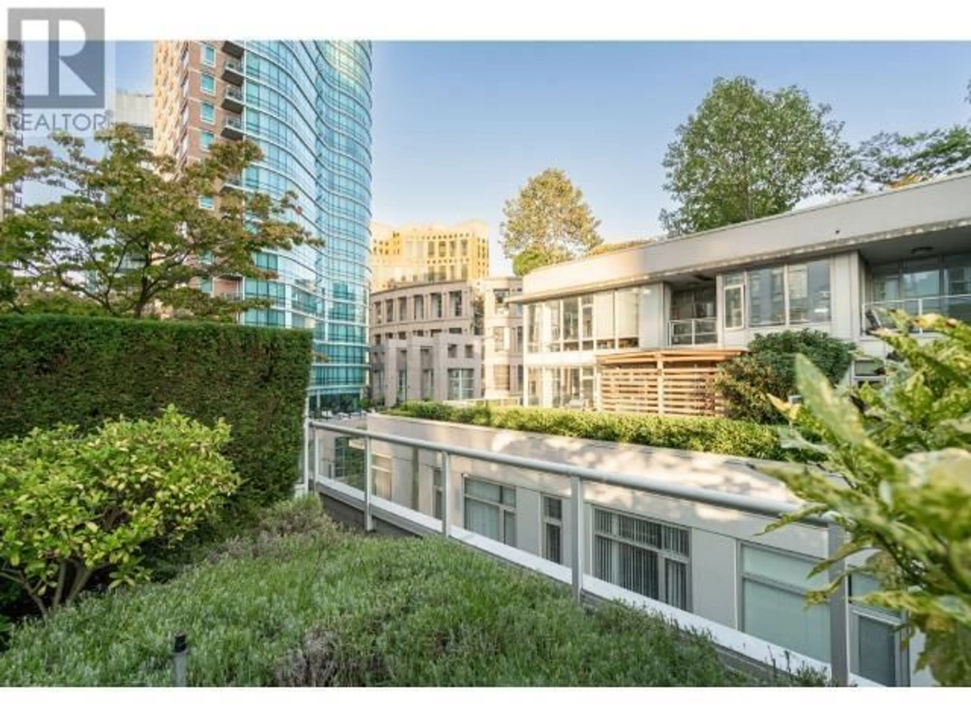 Patio, city buildings view from balcony for 1401 - 480 ROBSON STREET, Vancouver British Columbia V6B1S1