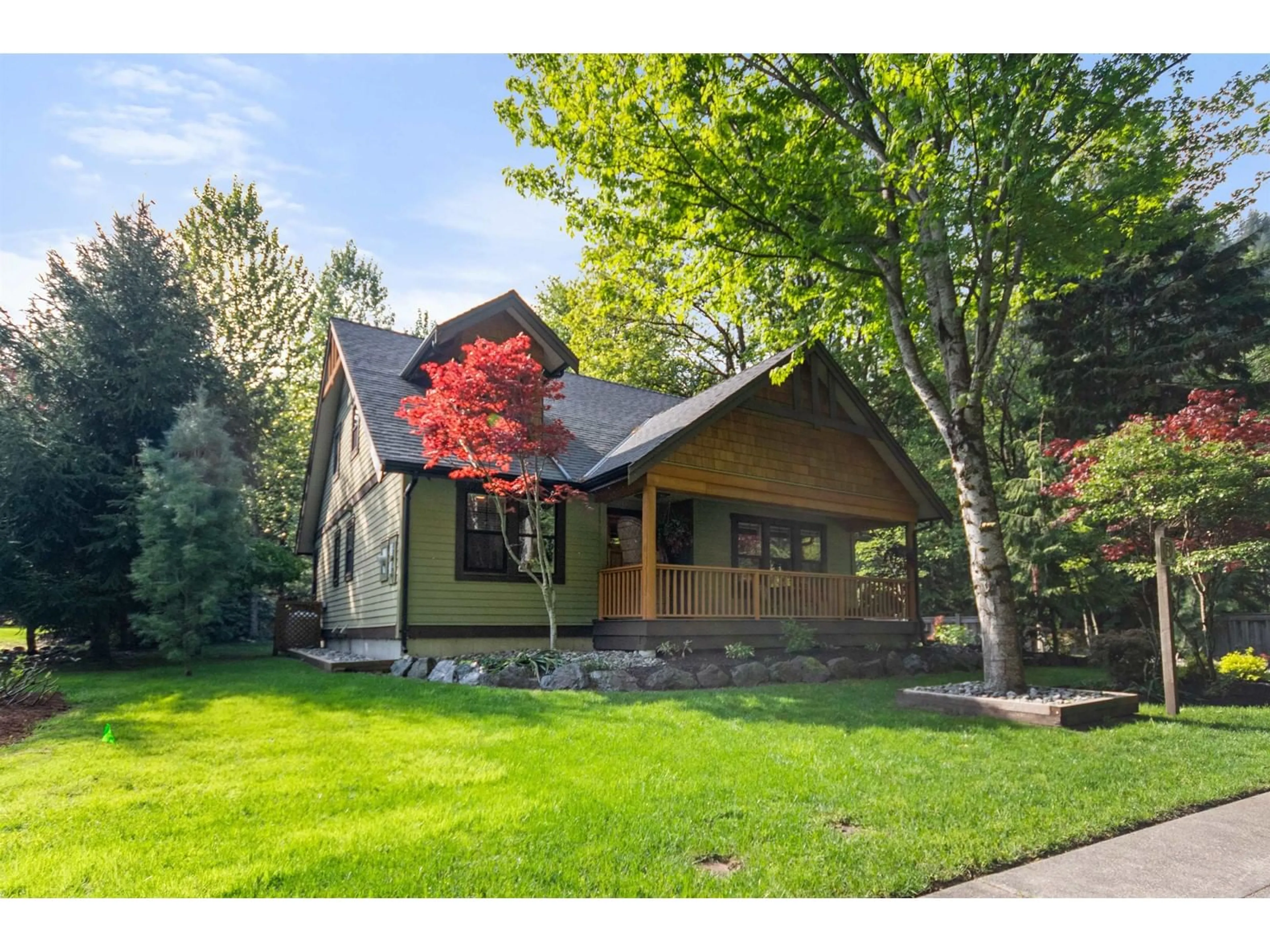 Home with vinyl exterior material, street for 1907 RAVENWOOD TRAIL, Lindell Beach British Columbia V2R0E1