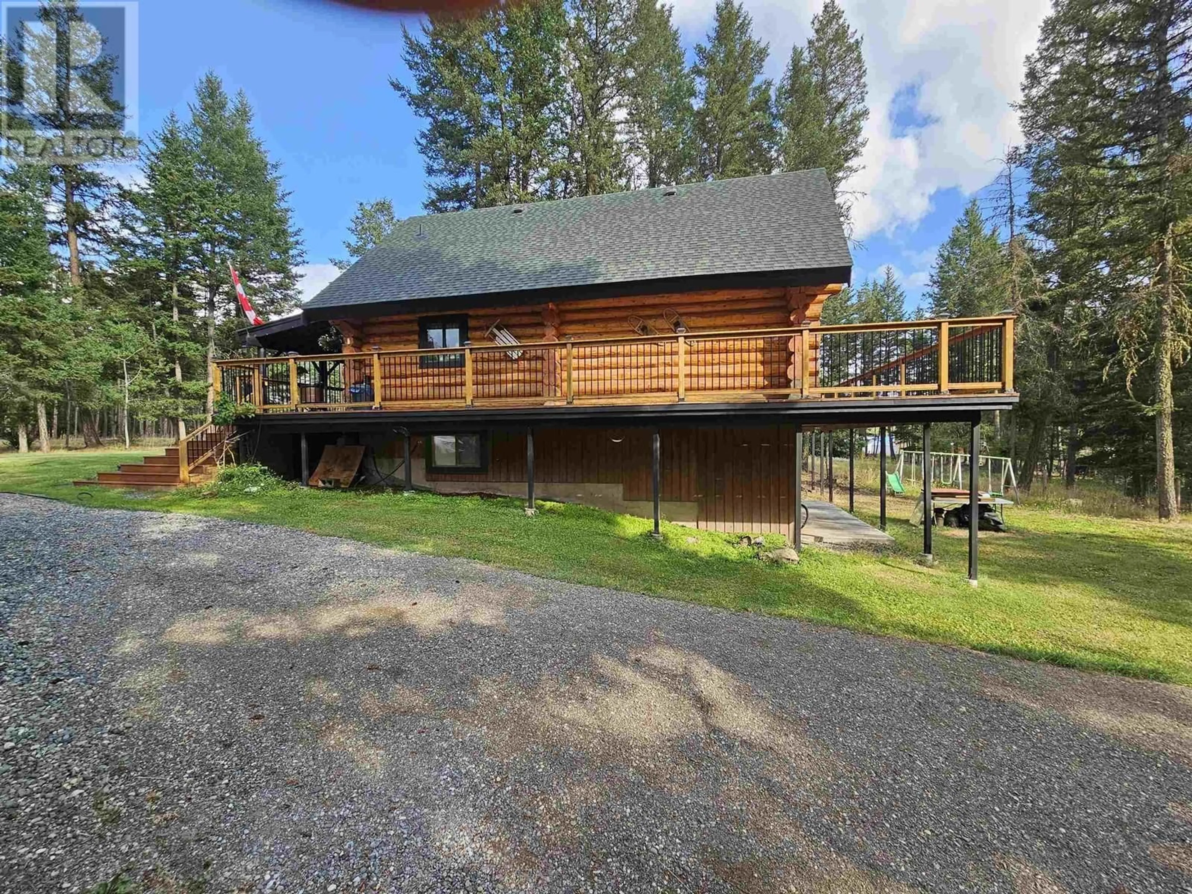 A pic from outside/outdoor area/front of a property/back of a property/a pic from drone, water/lake/river/ocean view for 4884 KITWANGA DRIVE, 108 Mile Ranch British Columbia V0K2Z0