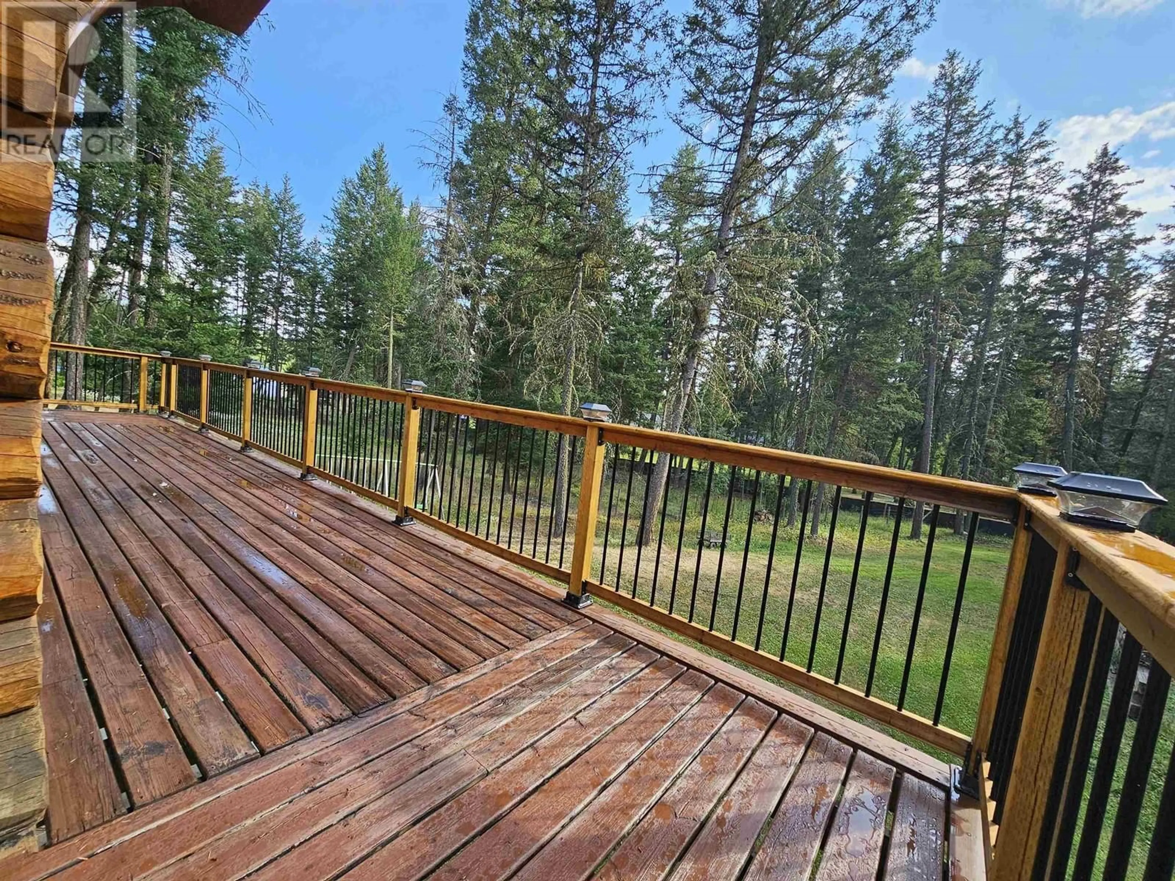 Patio, forest/trees view for 4884 KITWANGA DRIVE, 108 Mile Ranch British Columbia V0K2Z0