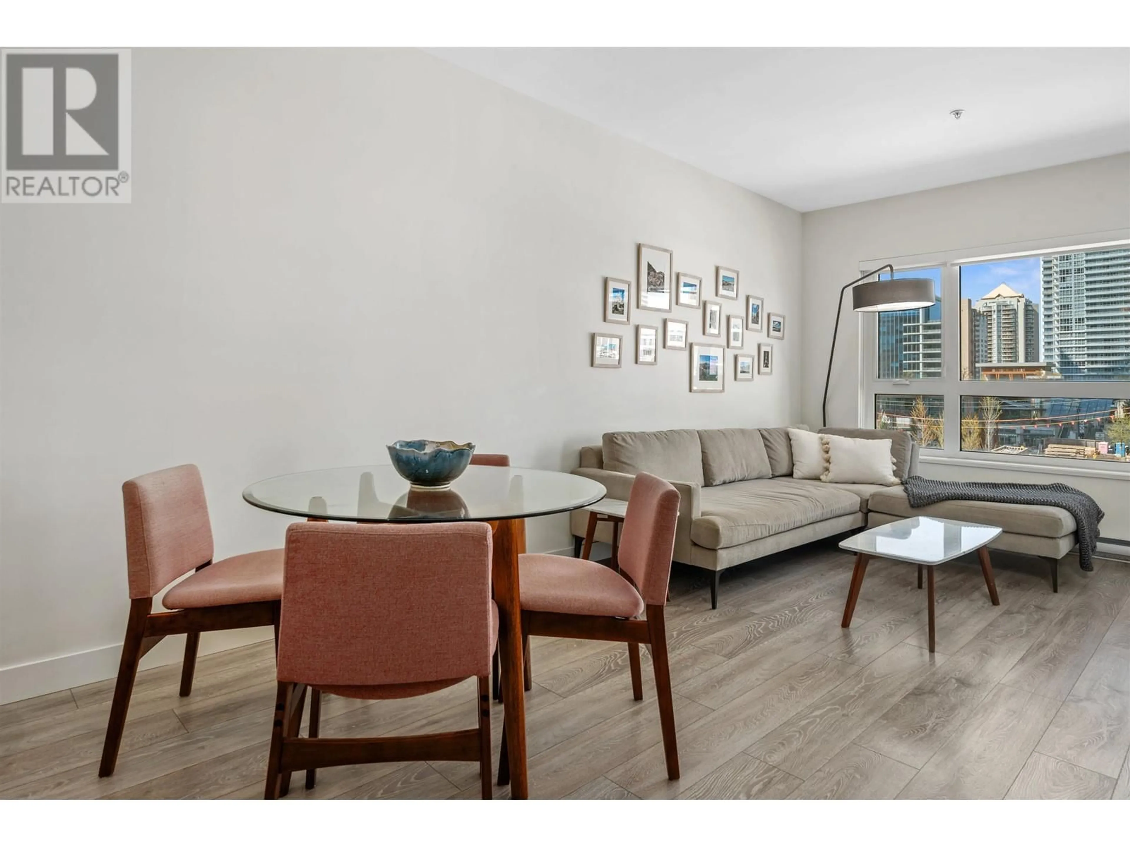 Living room with furniture, wood/laminate floor for 402 - 4468 DAWSON STREET, Burnaby British Columbia V5C0J9