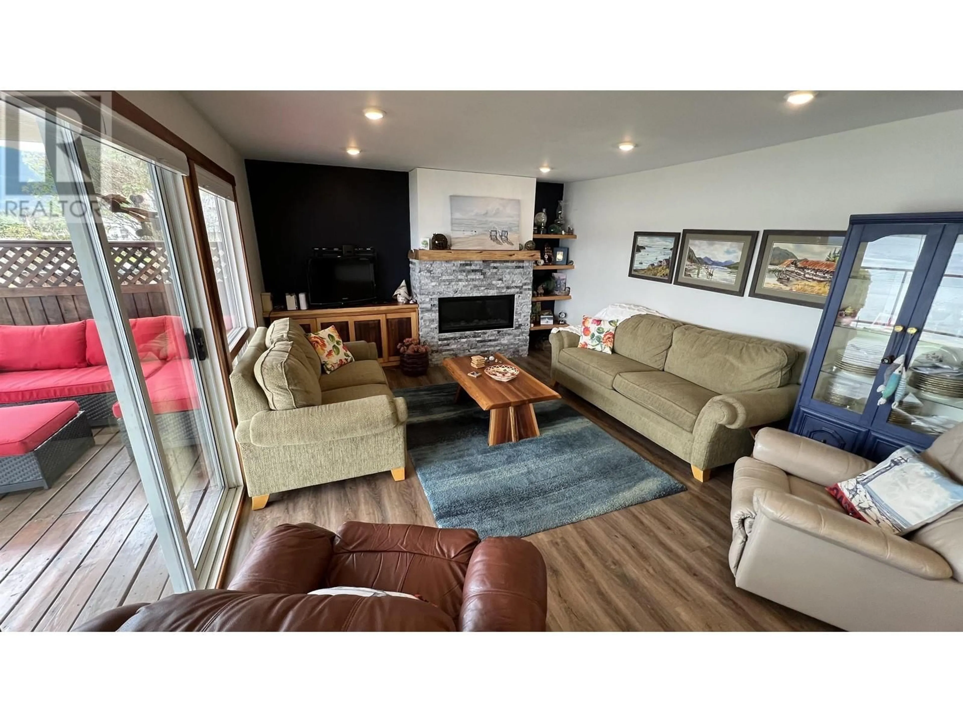 Living room with furniture, wood/laminate floor for 2765 FIRST AVENUE, Terrace British Columbia V8G0G2