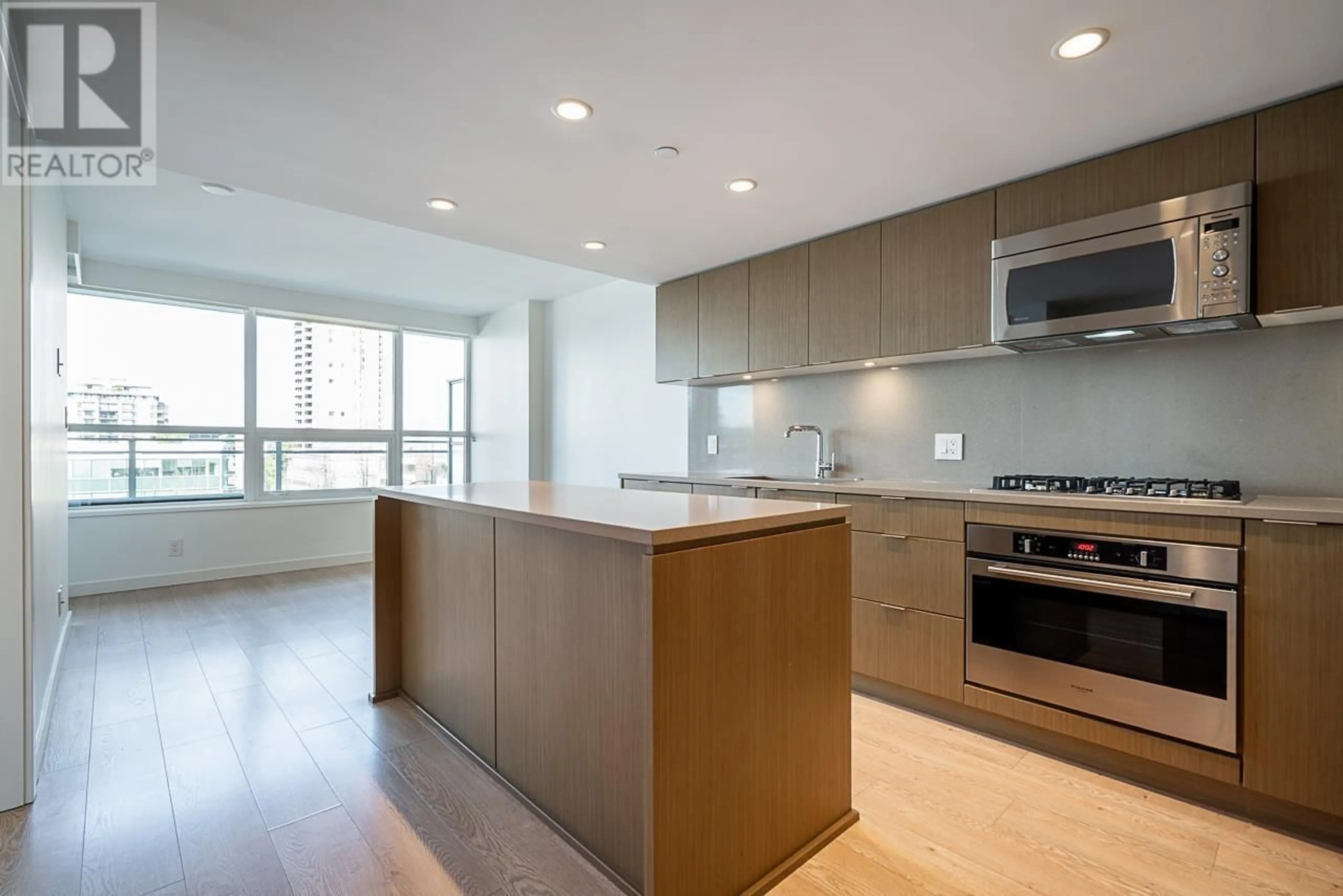 Open concept kitchen, unknown for 306 - 125 14TH STREET, Vancouver British Columbia V7L0E6