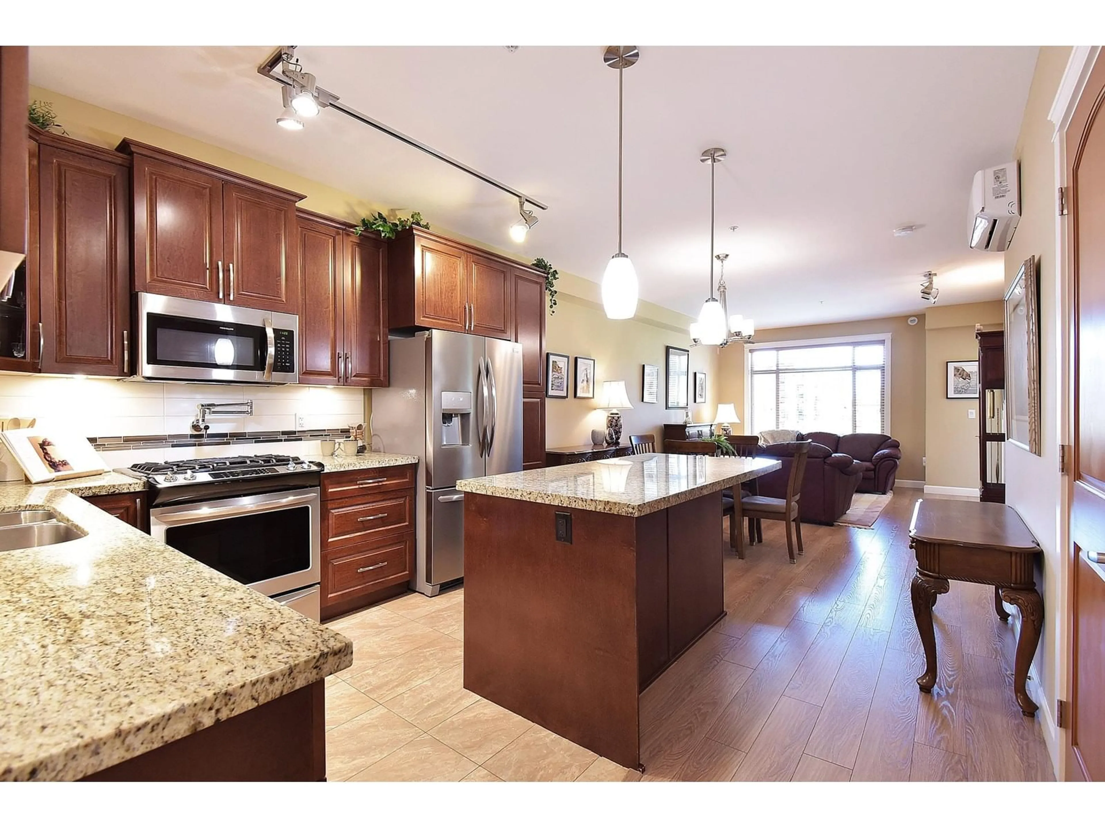 Open concept kitchen, unknown for A402 - 8218 207A, Langley British Columbia V2Y0X9