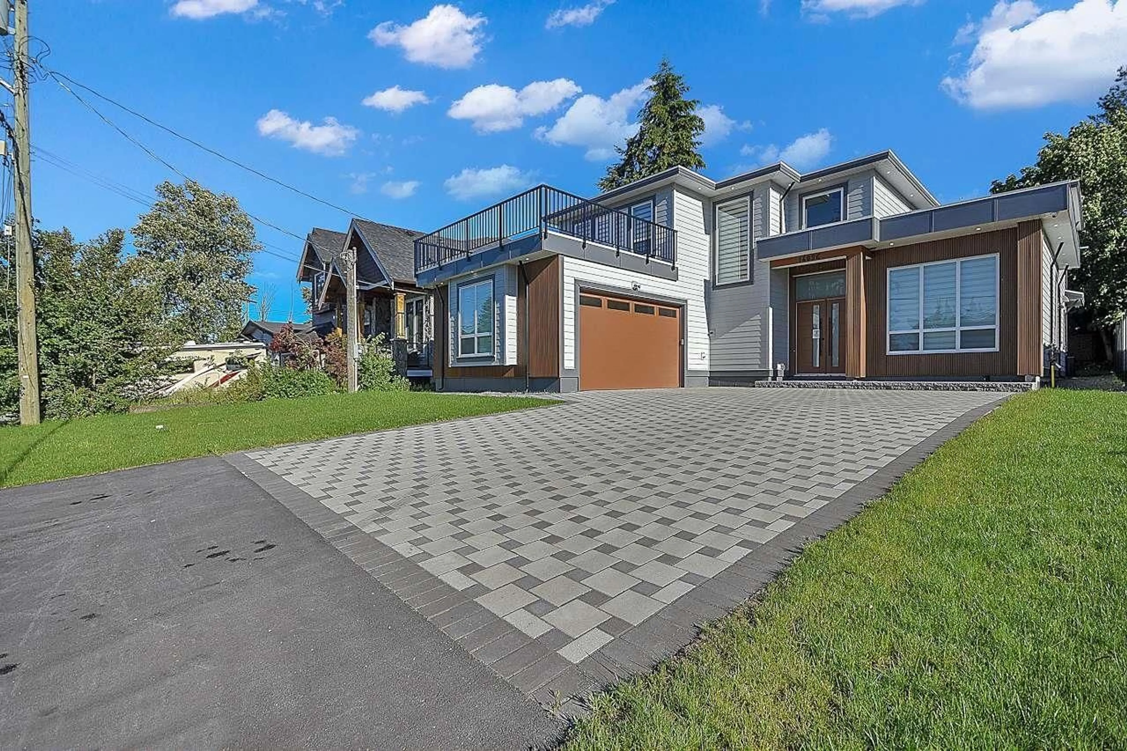 Home with brick exterior material, street for 14096 113A, Surrey British Columbia V3V1W7