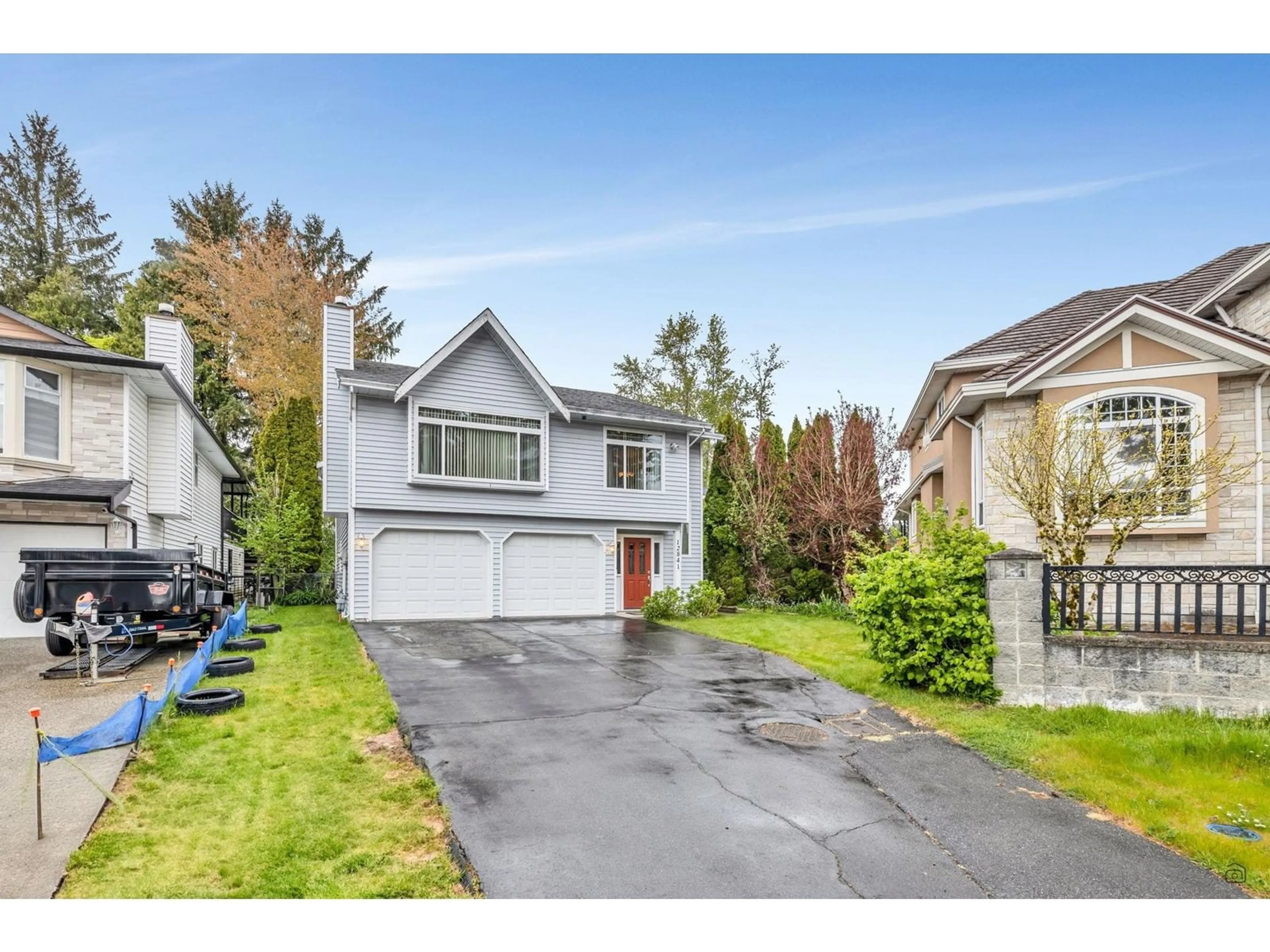 Home with vinyl exterior material, street for 12841 69, Surrey British Columbia V3W6W3