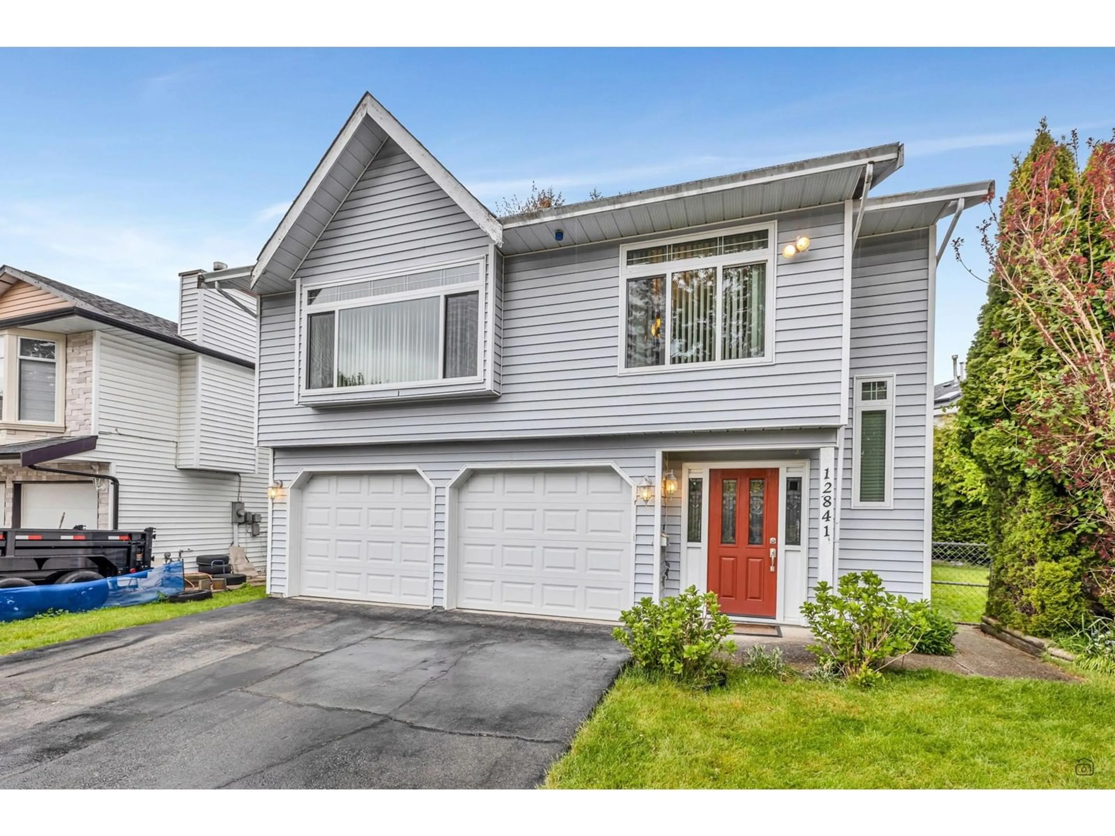 Home with vinyl exterior material, street for 12841 69, Surrey British Columbia V3W6W3