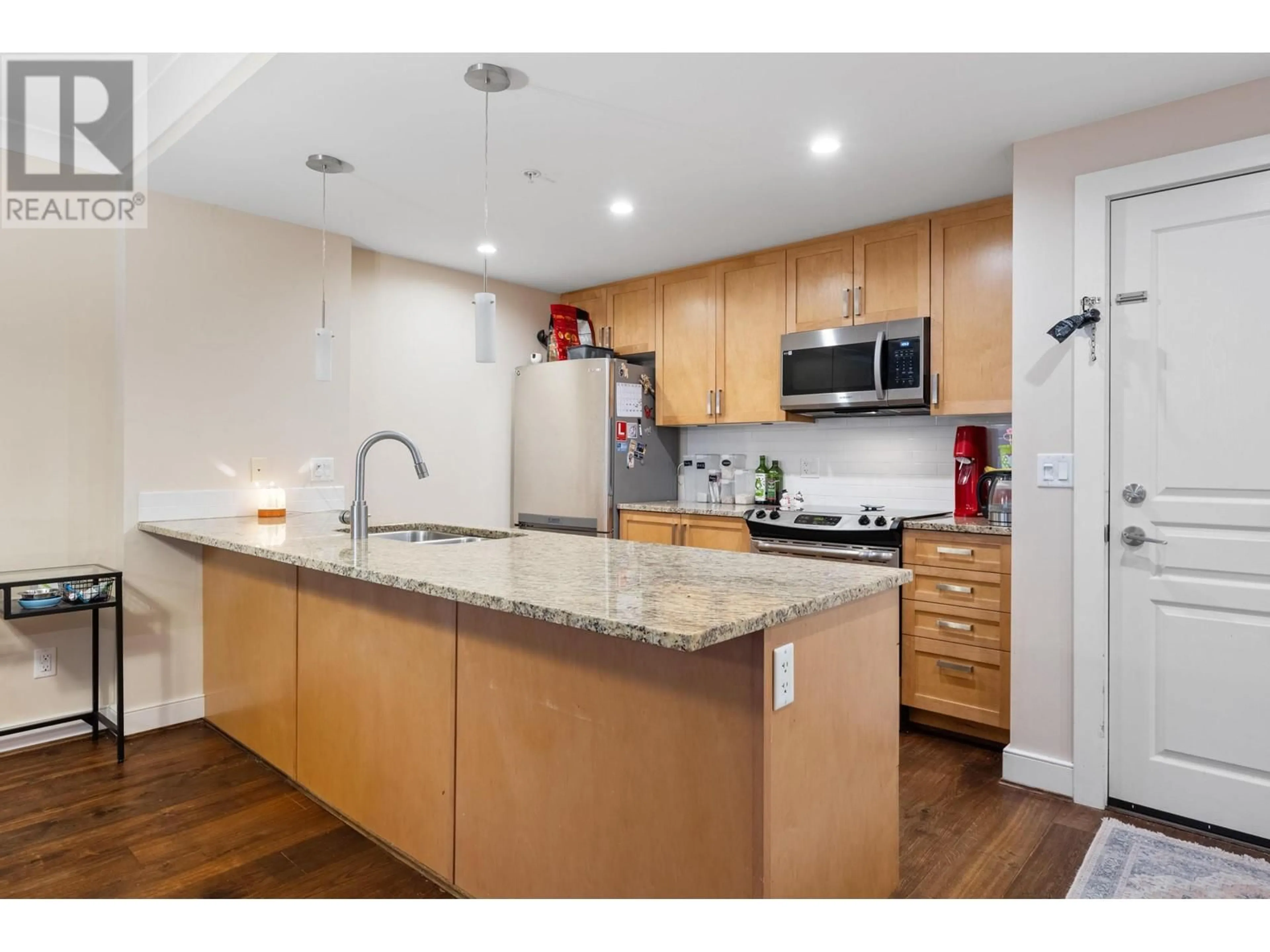 Open concept kitchen, unknown for 208 - 5599 14B AVENUE, Delta British Columbia V4M0A3