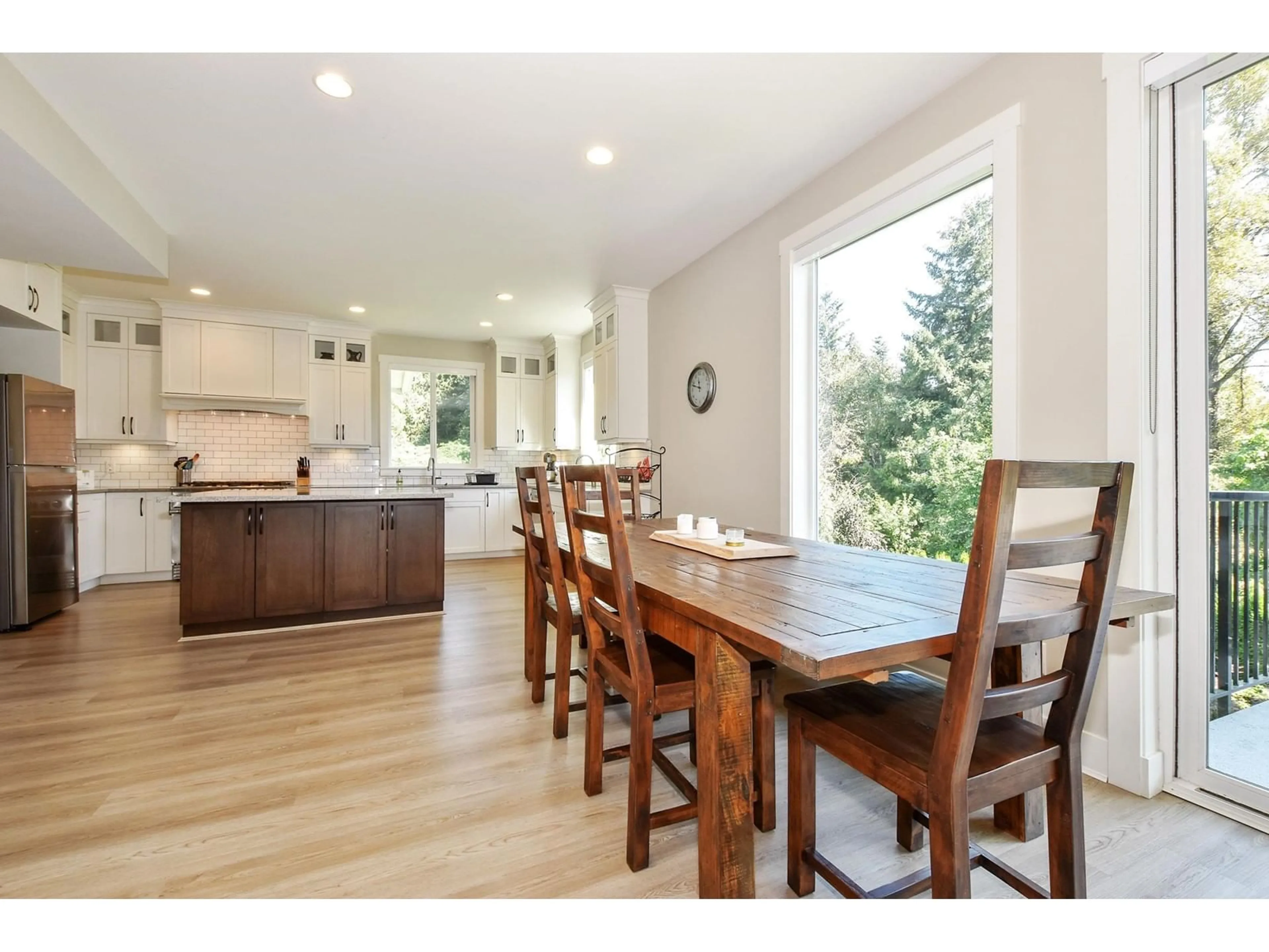 Open concept kitchen, wood/laminate floor for 2884 BABICH, Abbotsford British Columbia V2S3K5
