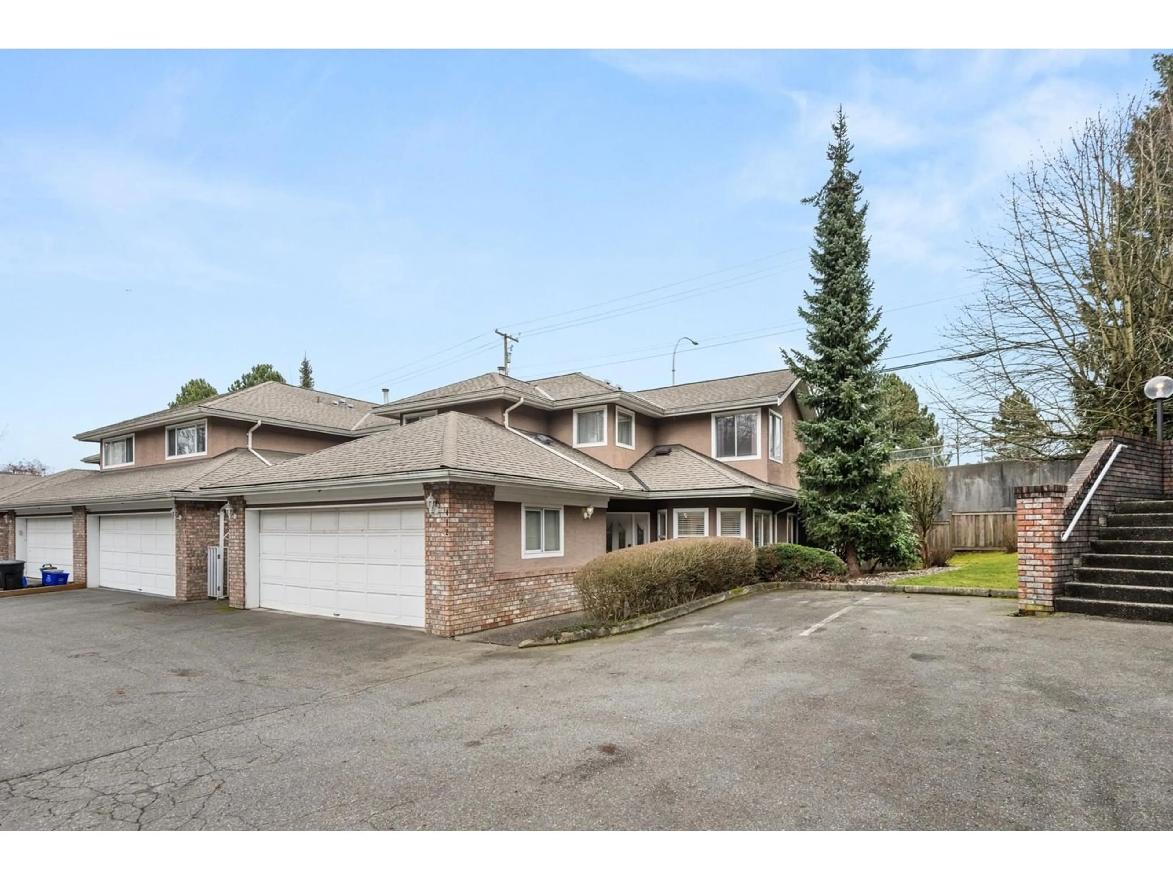 A pic from outside/outdoor area/front of a property/back of a property/a pic from drone, street for 412 - 6866 NICHOLSON, Delta British Columbia V4E3M6