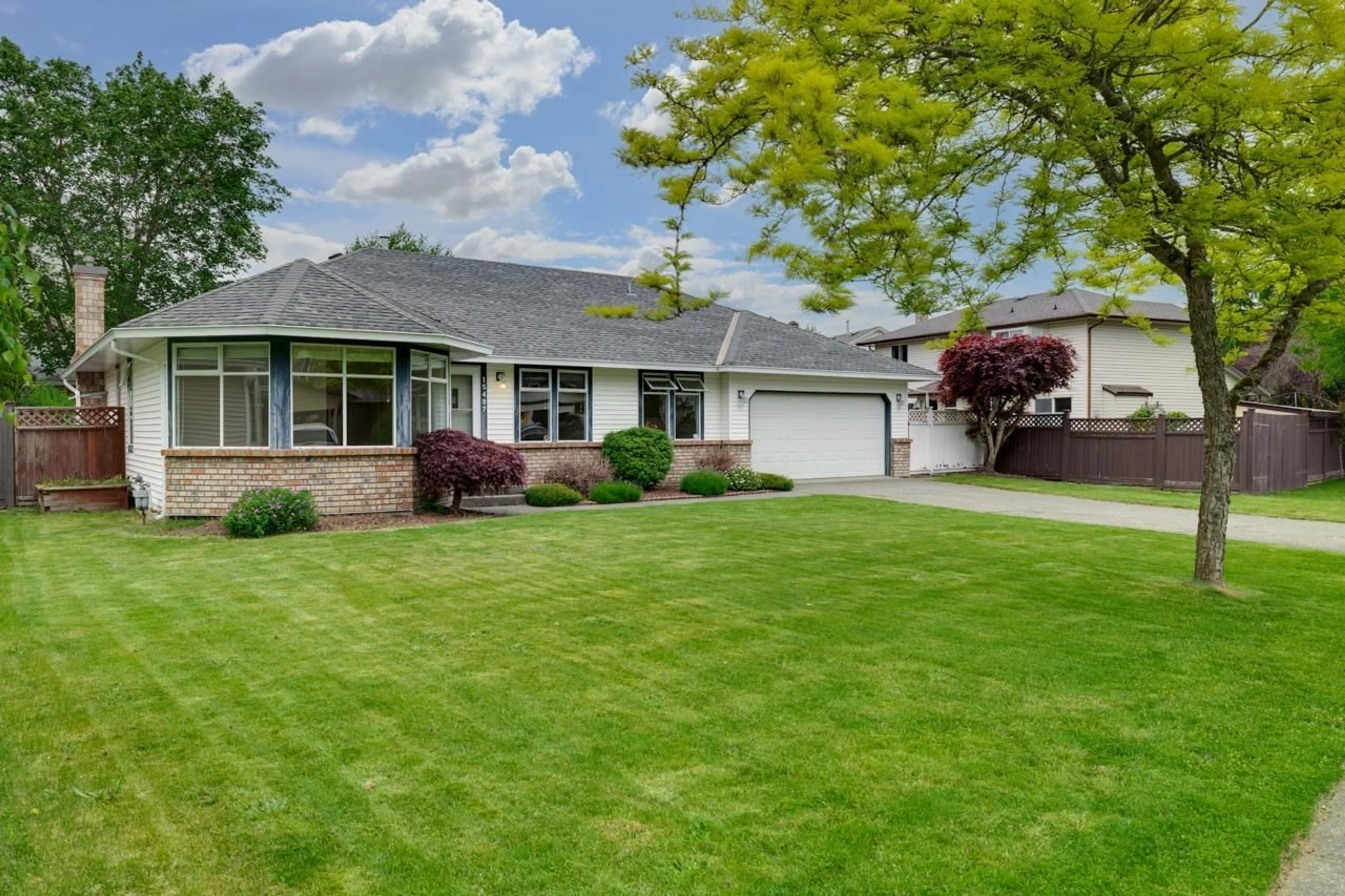 Home with vinyl exterior material, street for 15487 93, Surrey British Columbia V3R9B6