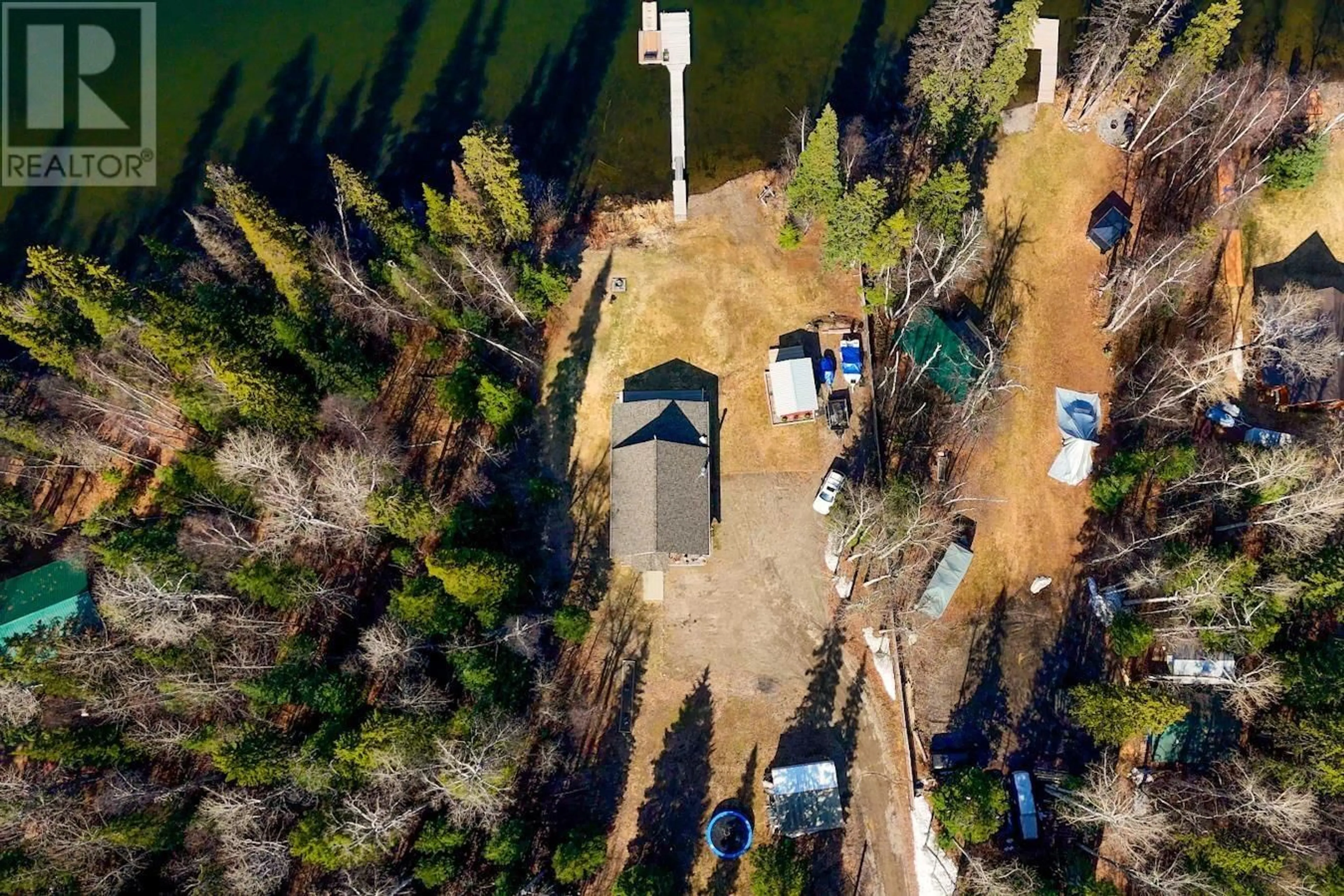 A pic from outside/outdoor area/front of a property/back of a property/a pic from drone, water/lake/river/ocean view for 24980 MURCH LAKE ROAD, Prince George British Columbia V2K5L4