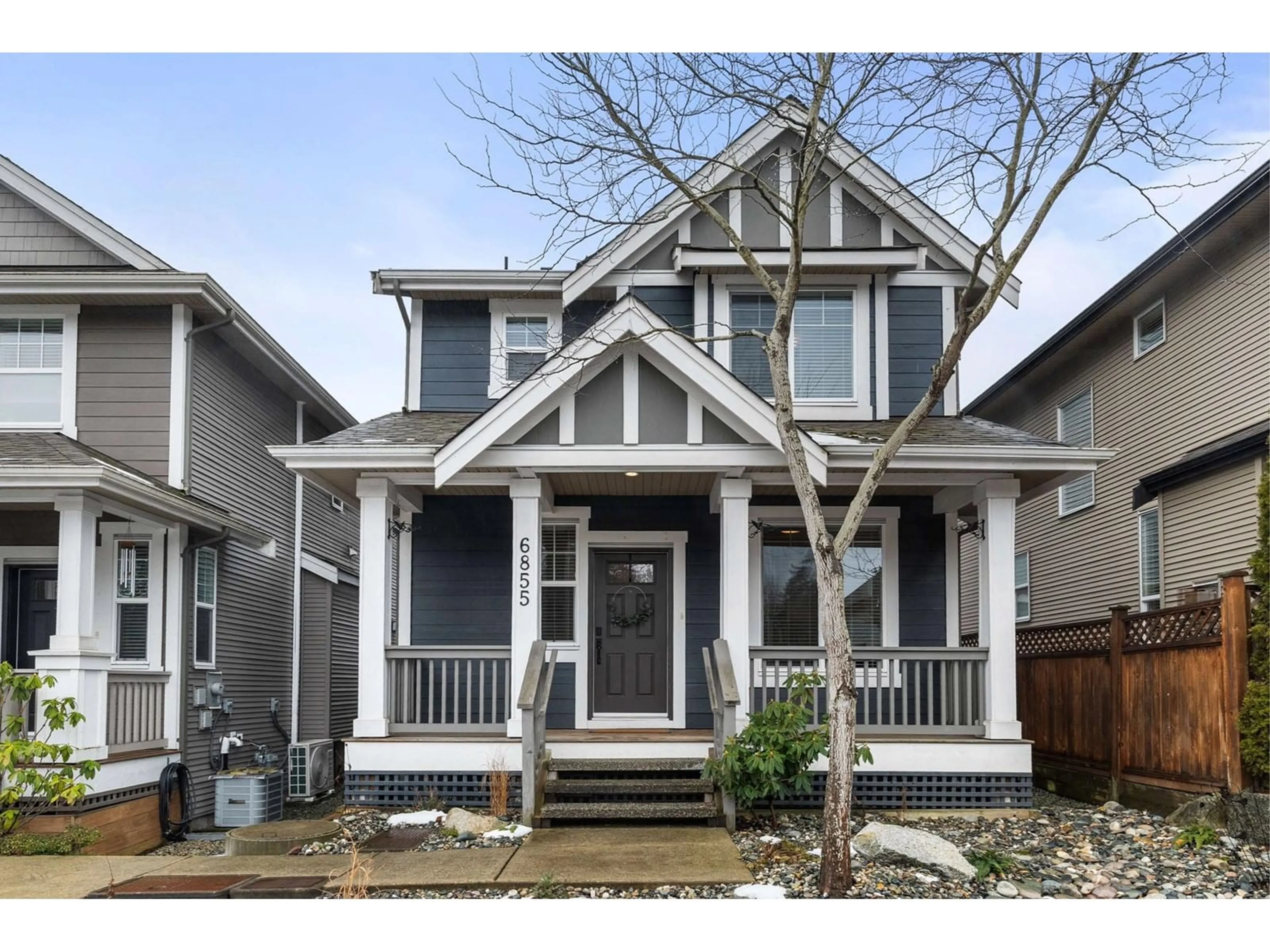 Home with vinyl exterior material, street for 6855 208A, Langley British Columbia V2Y0G2