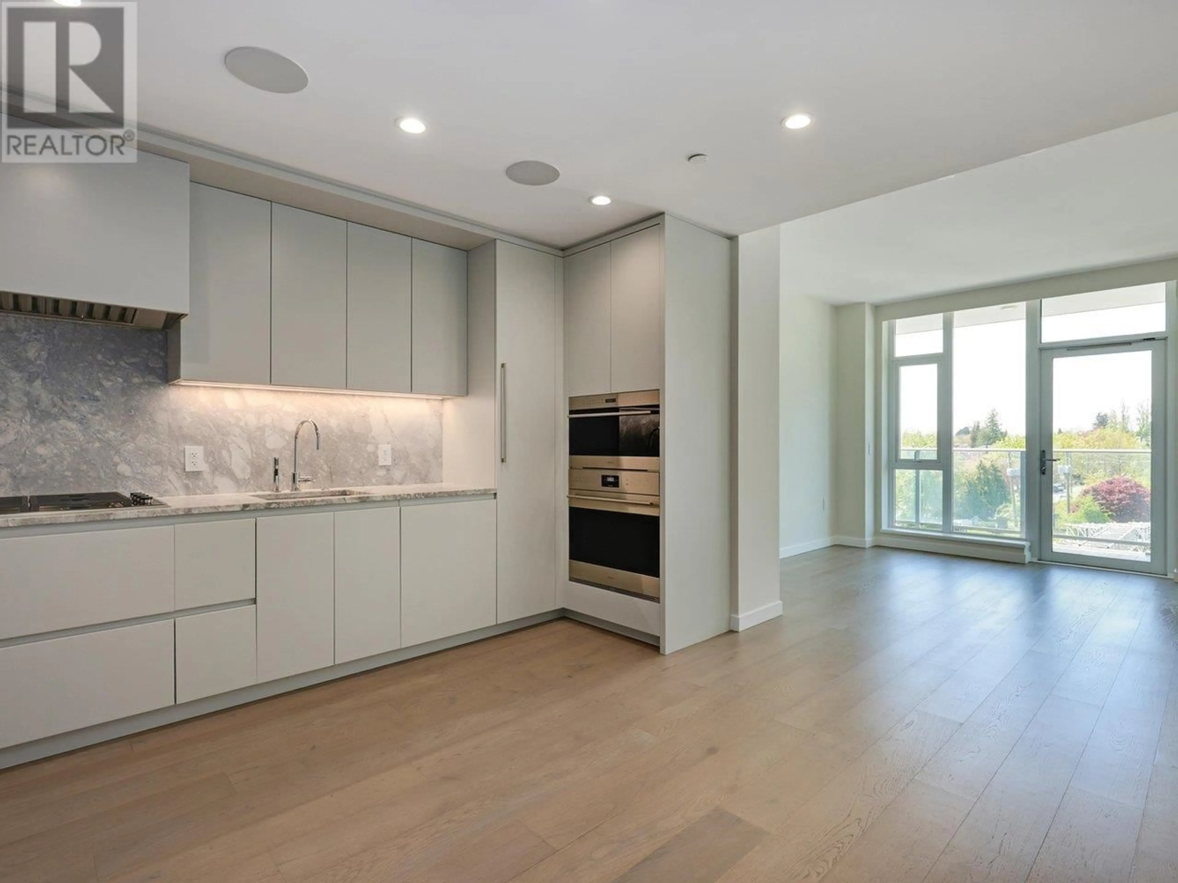Open concept kitchen, unknown for 607 - 7418 PAULSON STREET, Vancouver British Columbia V6P0K2