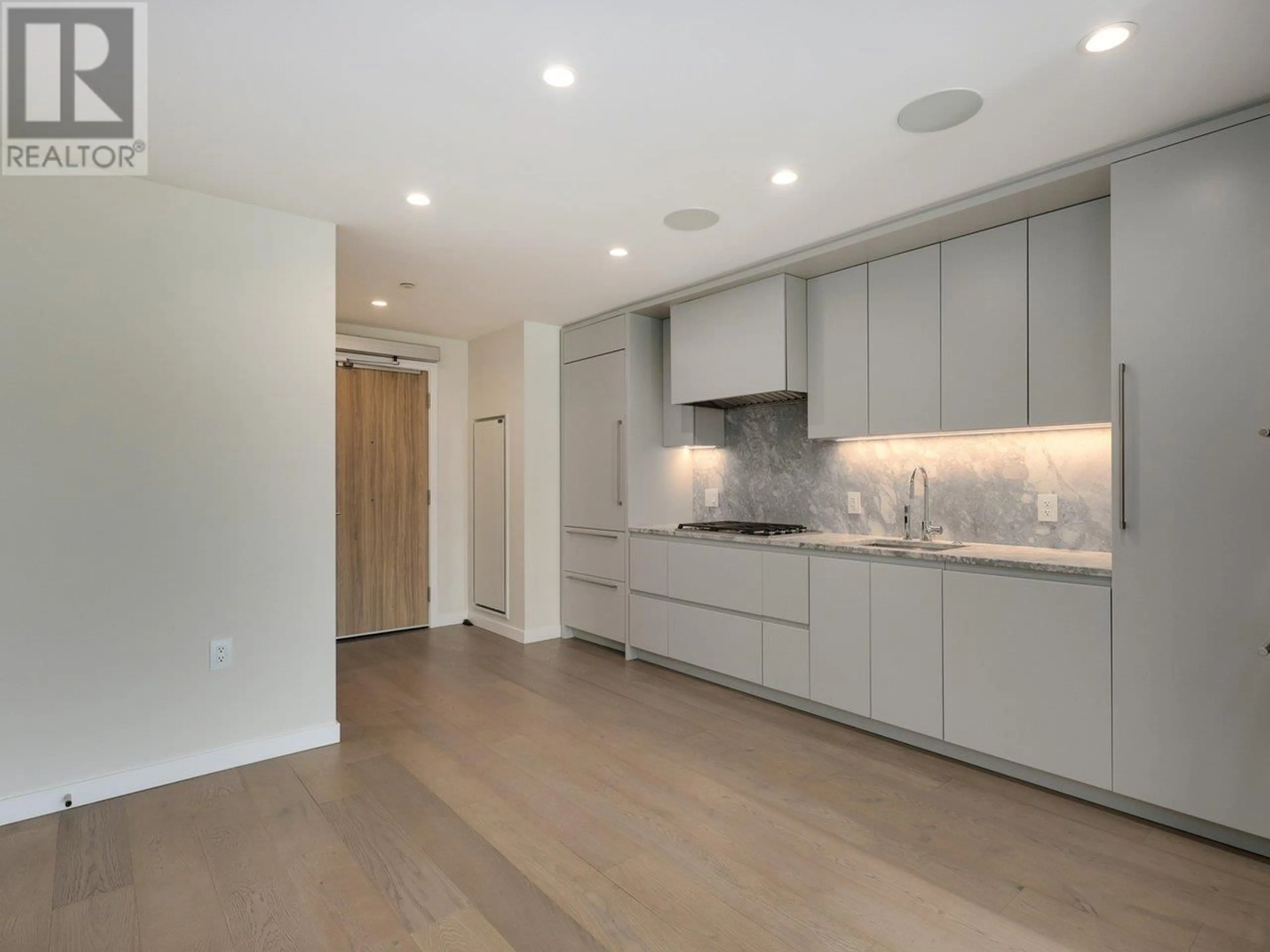 Open concept kitchen, unknown for 607 - 7418 PAULSON STREET, Vancouver British Columbia V6P0K2