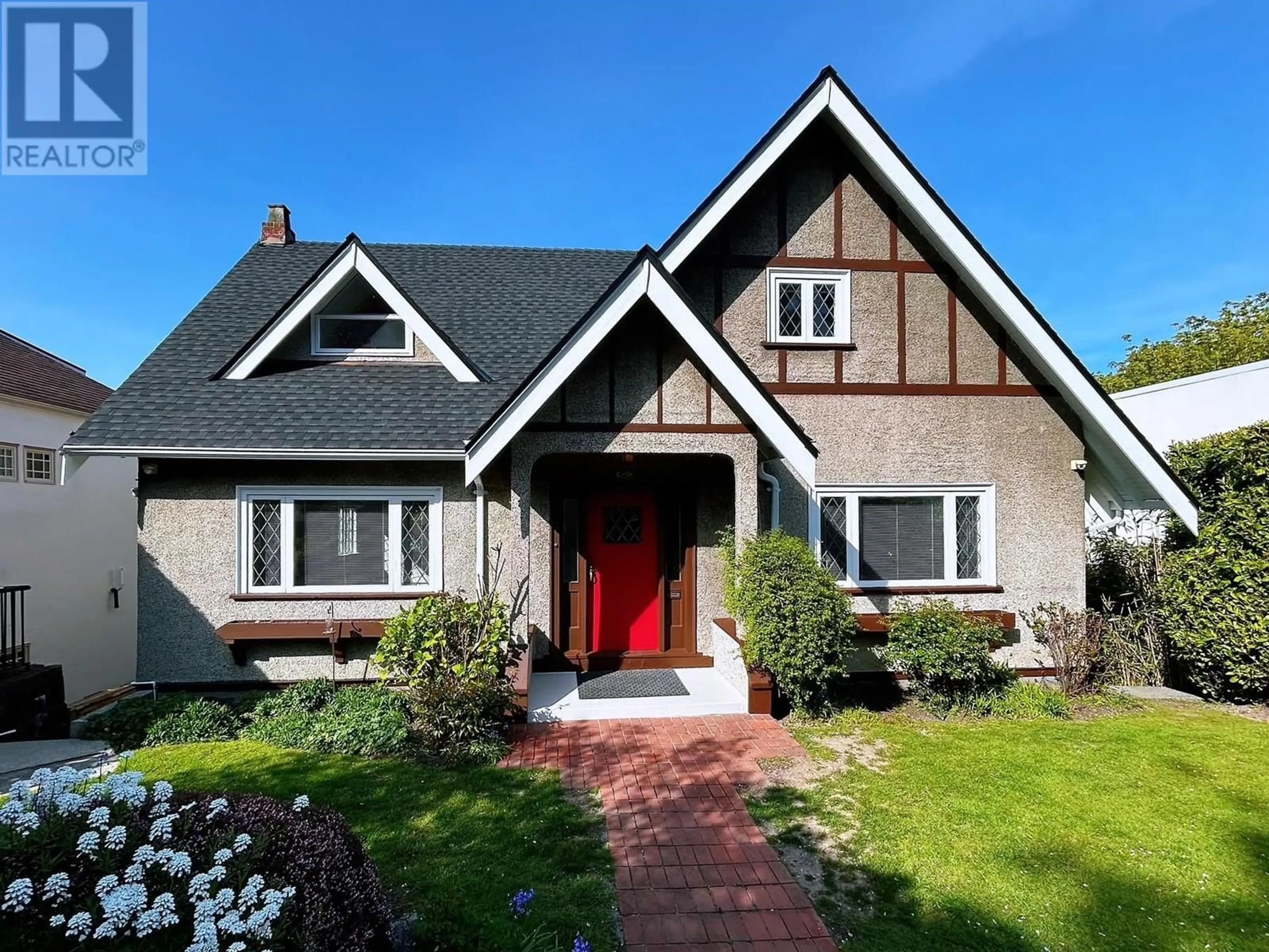 Home with brick exterior material, street for 4309 LOCARNO CRESCENT, Vancouver British Columbia V6R1G2