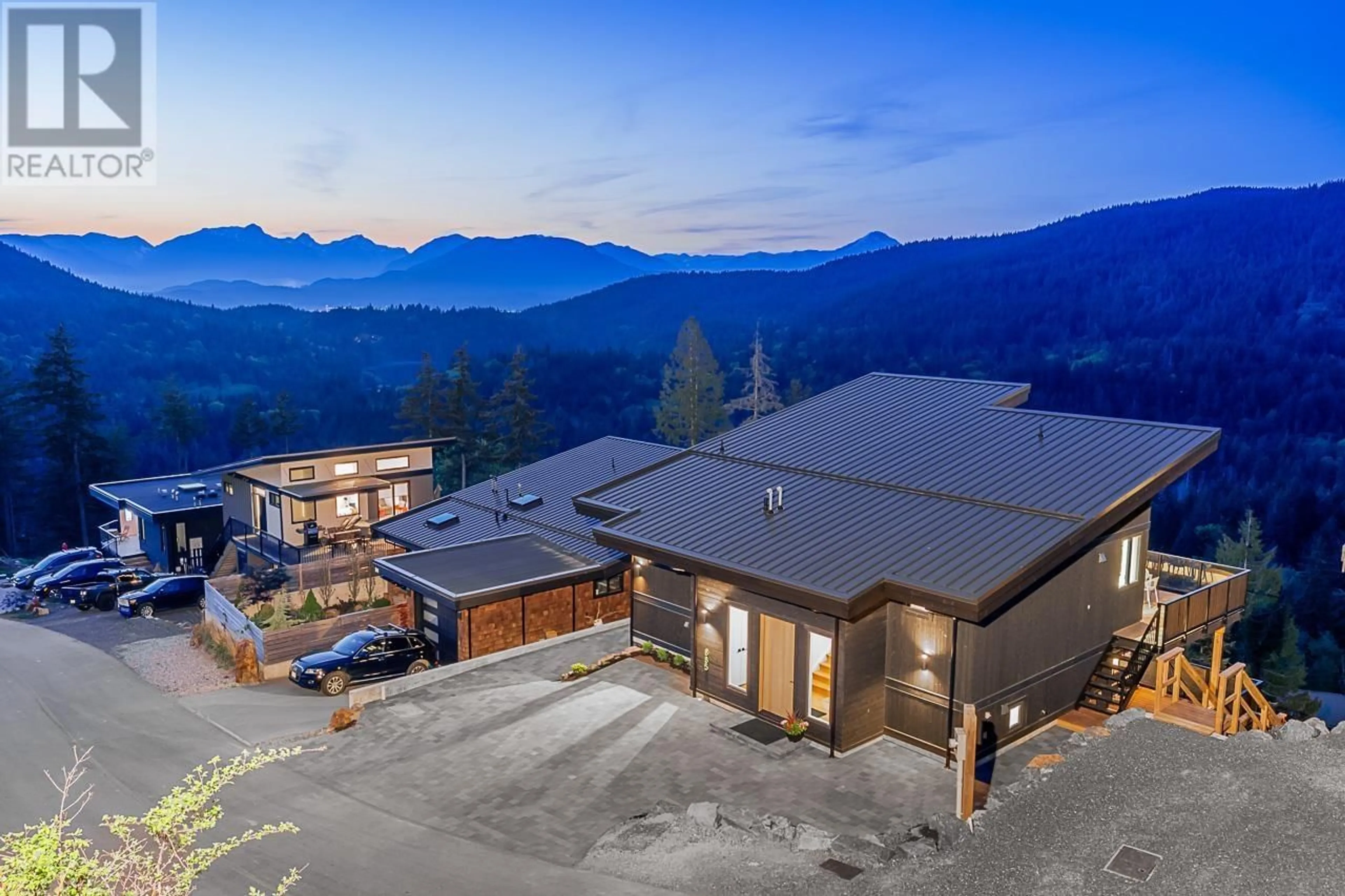 A pic from outside/outdoor area/front of a property/back of a property/a pic from drone, mountain view for 885 RIVENDELL DRIVE, Bowen Island British Columbia V0N1G0