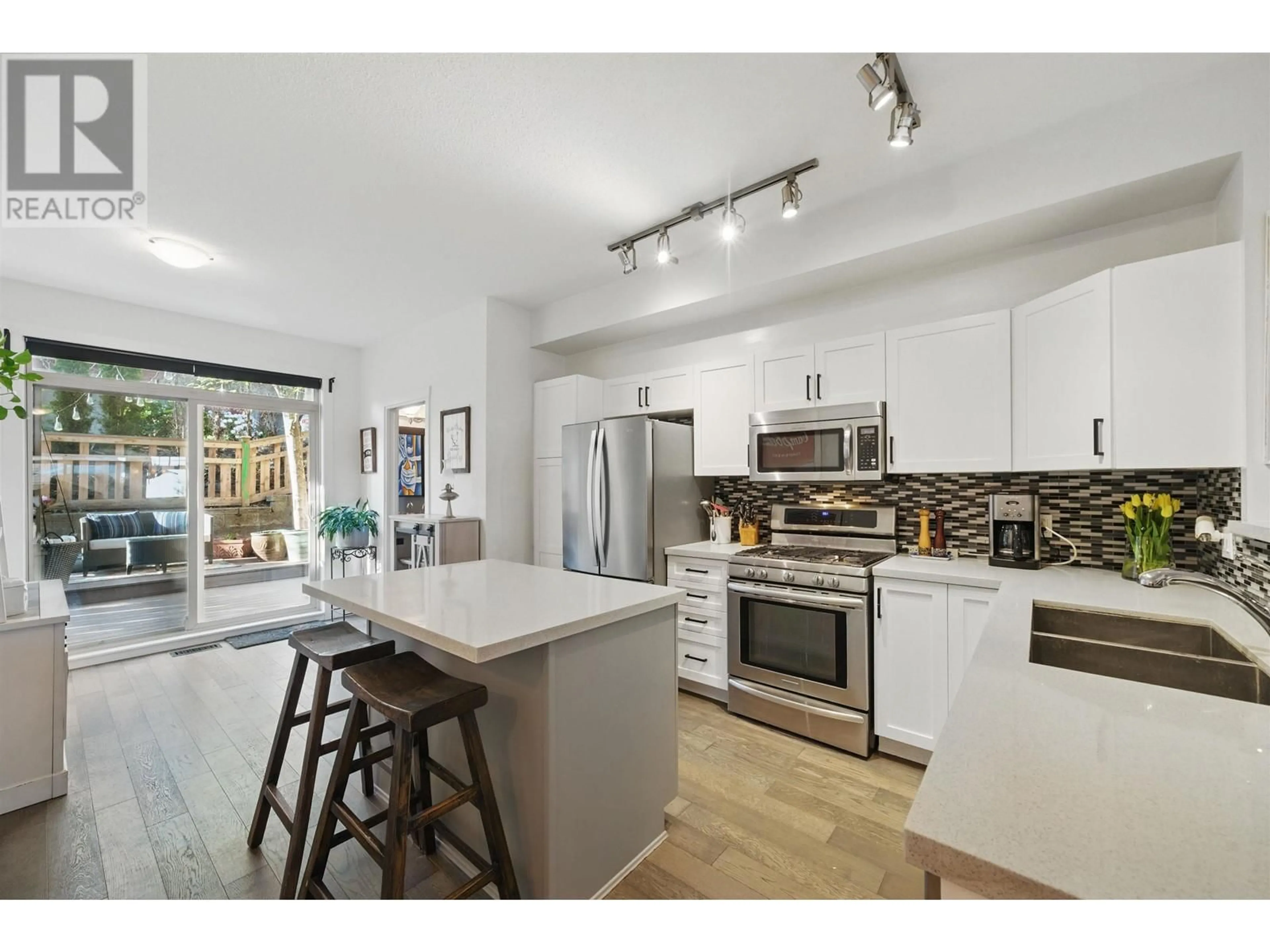 Open concept kitchen, ceramic/tile floor for 44 - 55 HAWTHORN DRIVE, Port Moody British Columbia V3H0B3