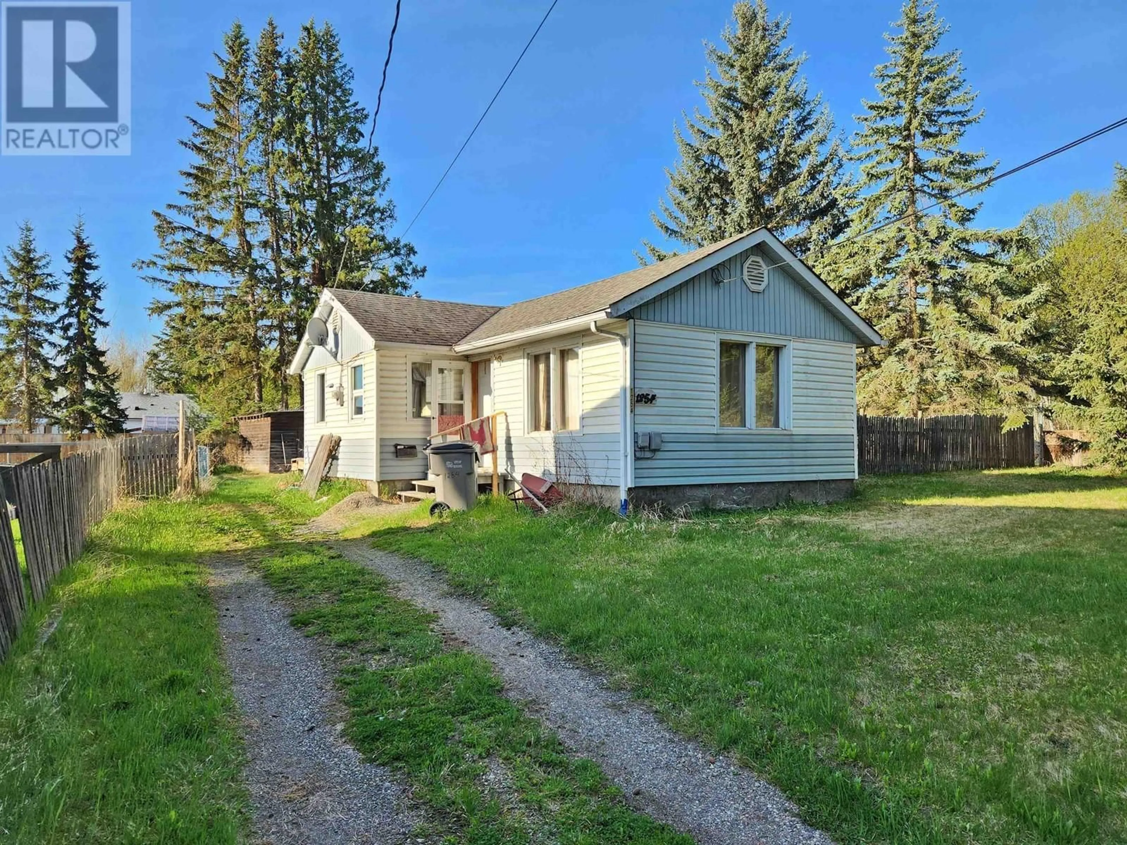 A pic from outside/outdoor area/front of a property/back of a property/a pic from drone, street for 1254 ABBOTT DRIVE, Quesnel British Columbia V2J1J1