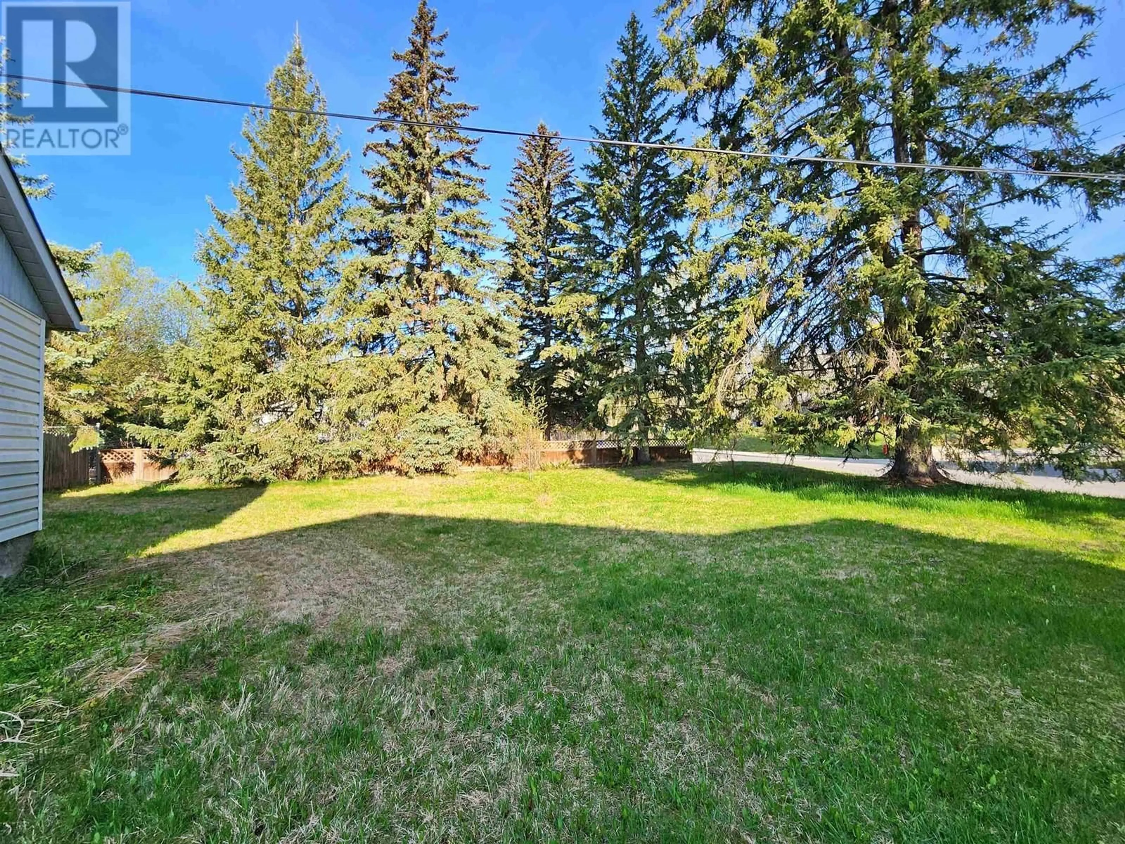 A pic from outside/outdoor area/front of a property/back of a property/a pic from drone, forest/trees view for 1254 ABBOTT DRIVE, Quesnel British Columbia V2J1J1