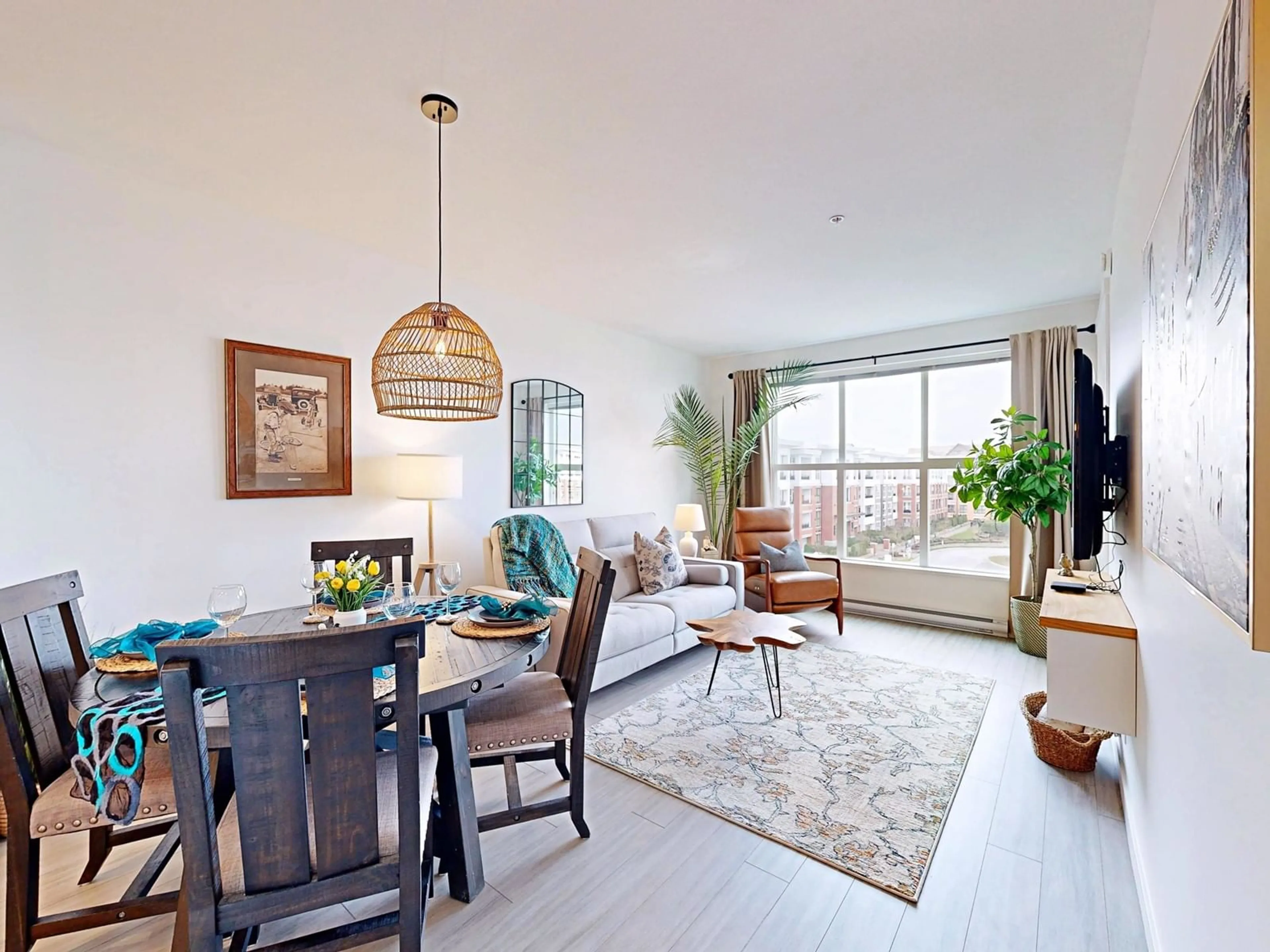 Living room with furniture, wood/laminate floor for C427 - 8150 207, Langley British Columbia V2Y4J4