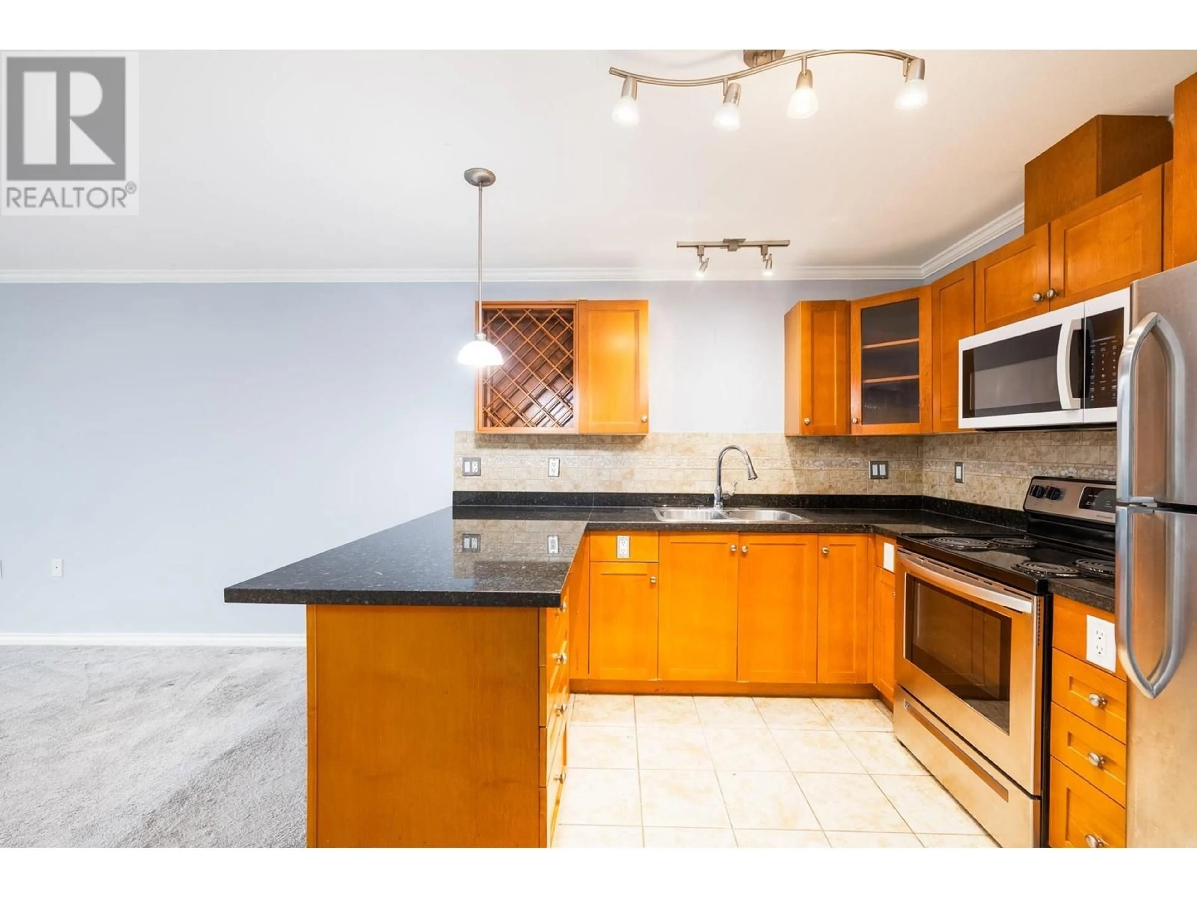 Standard kitchen, ceramic/tile floor for 402 - 22255 122 AVENUE, Maple Ridge British Columbia V2X3X8