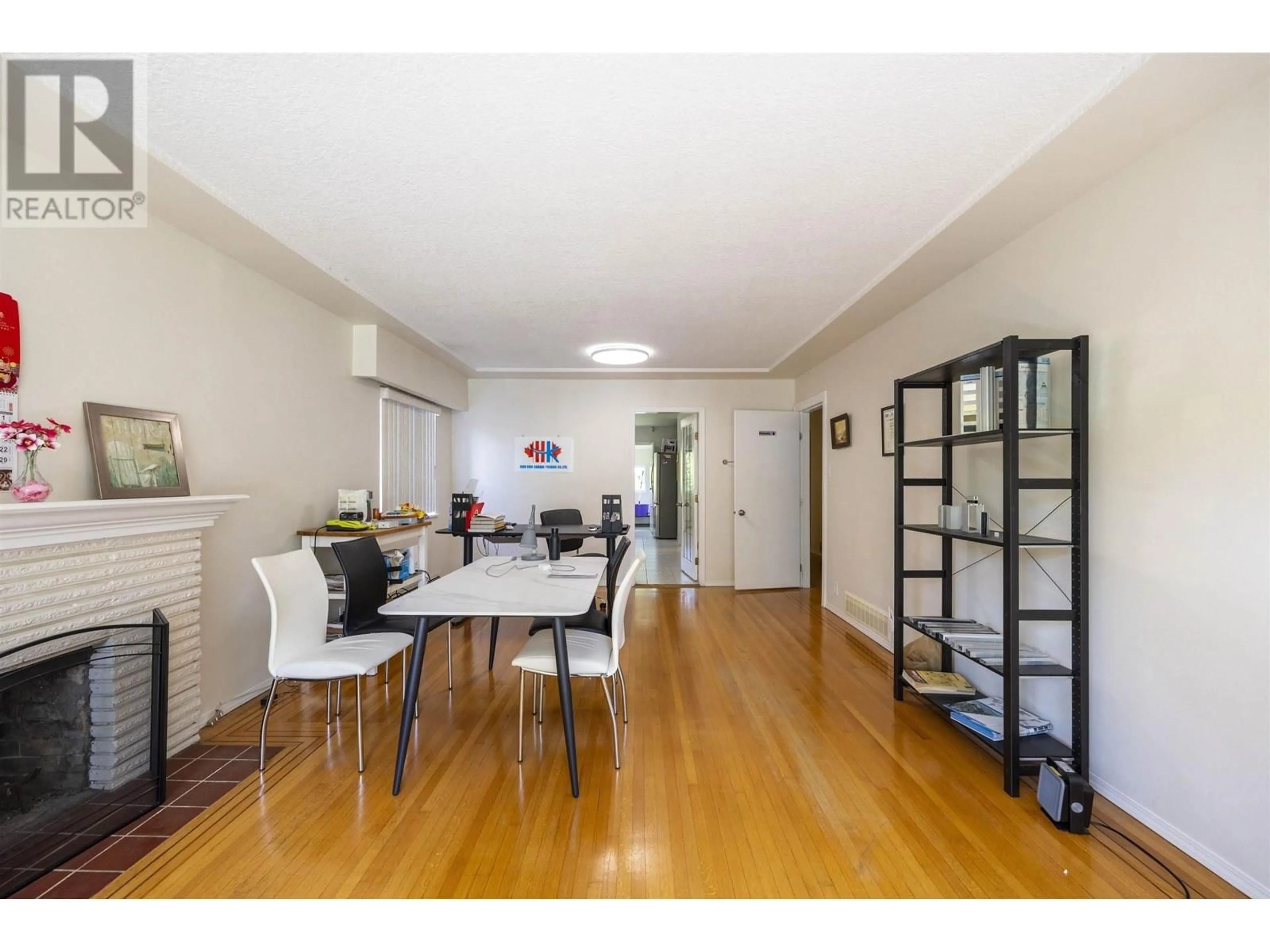 Dining room, wood/laminate floor for 4663 15TH AVENUE, Vancouver British Columbia V6R3B5