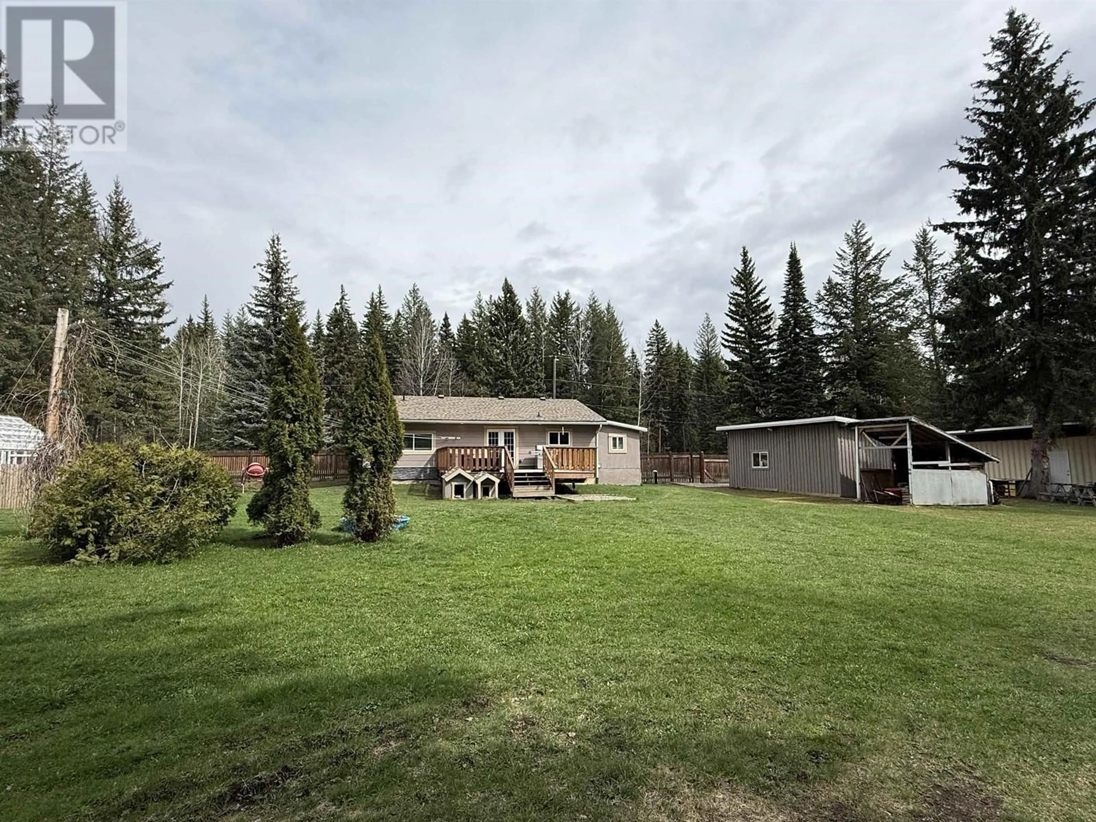 A pic from outside/outdoor area/front of a property/back of a property/a pic from drone, forest/trees view for 4007 AIRD ROAD, Quesnel British Columbia V2J6V8